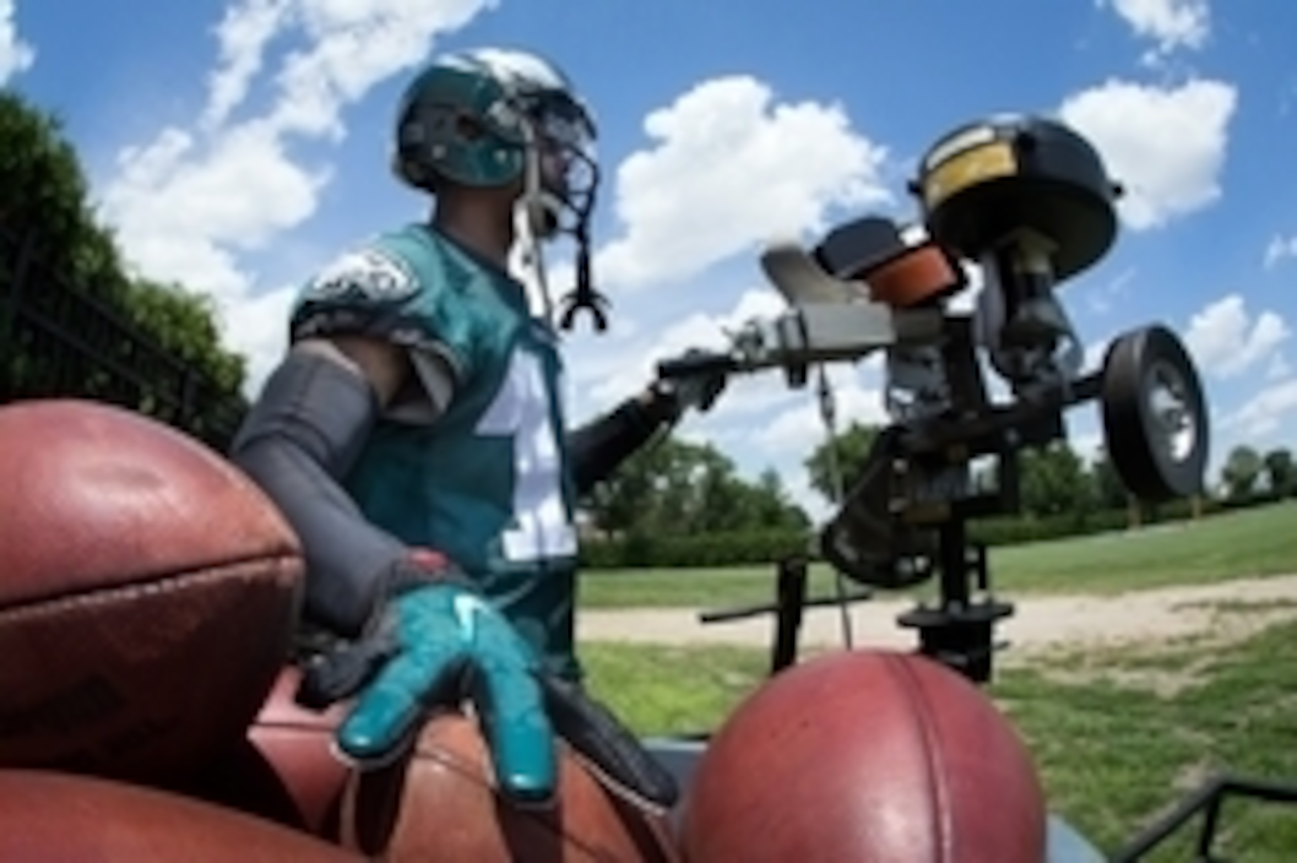 Jun 17, 2015; Philadelphia, PA, USA; Philadelphia Eagles wide receiver Josh Huff (13) works the ball launcher during minicamp at The NovaCare Complex. Mandatory Credit: Bill Streicher-USA TODAY Sports