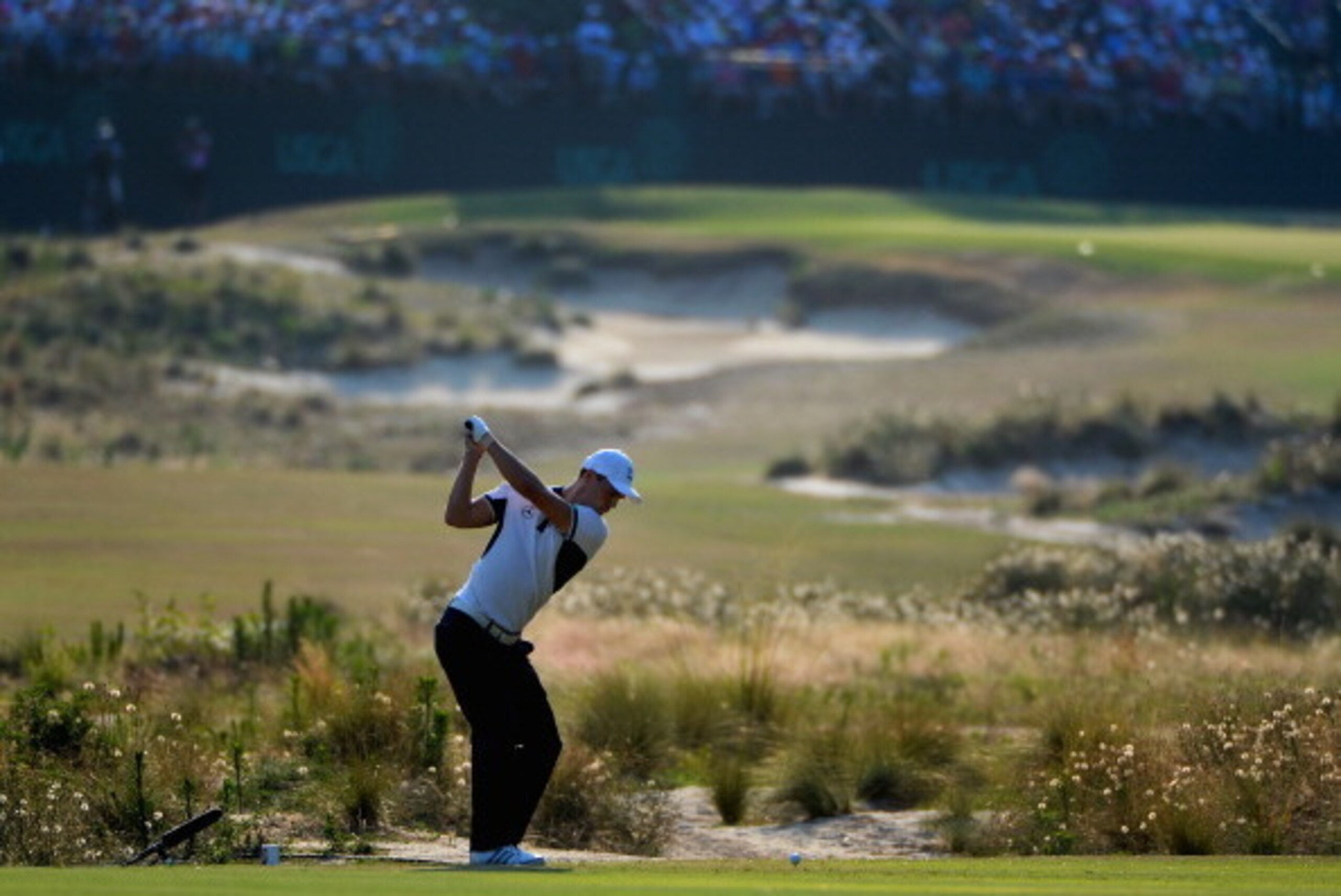 PINEHURST, NC - JUNE 15:  Martin Kaymer of Germany hits his tee shot on the 13th hole during the final round of the 114th U.S. Open at Pinehurst Resort & Country Club, Course No. 2 on June 15, 2014 in Pinehurst, North Carolina.  (Photo by Ross Kinnaird/Ge