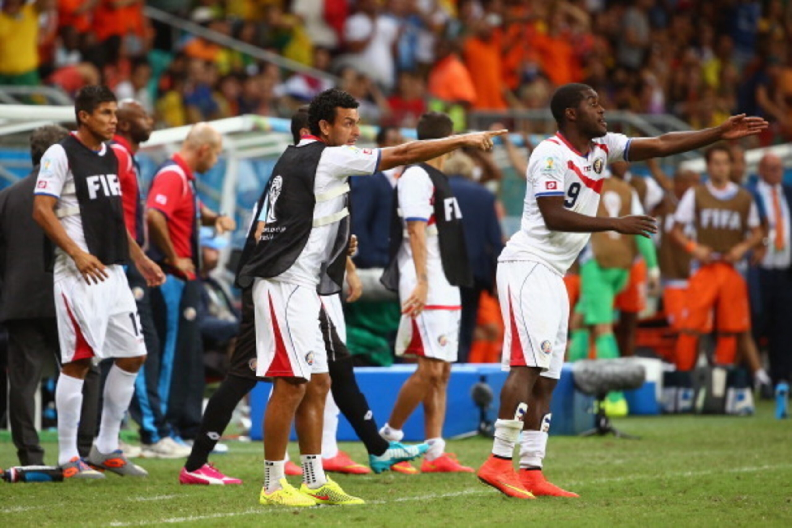 SALVADOR, BRAZIL - JULY 05:  Joel Campbell of Costa Rica (R) and teammates react during the extra time in the 2014 FIFA World Cup Brazil Quarter Final match between the Netherlands and Costa Rica at Arena Fonte Nova on July 5, 2014 in Salvador, Brazil.  (