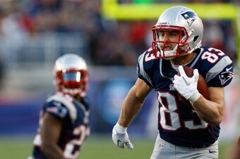 FOXBORO, MA - NOVEMBER 11:  Wes Welker #83 of the New England Patriots runs with the ball against the Buffalo Bills during the game on November 11, 2012 at Gillette Stadium in Foxboro, Massachusetts.  (Photo by Jared Wickerham/Getty Images)