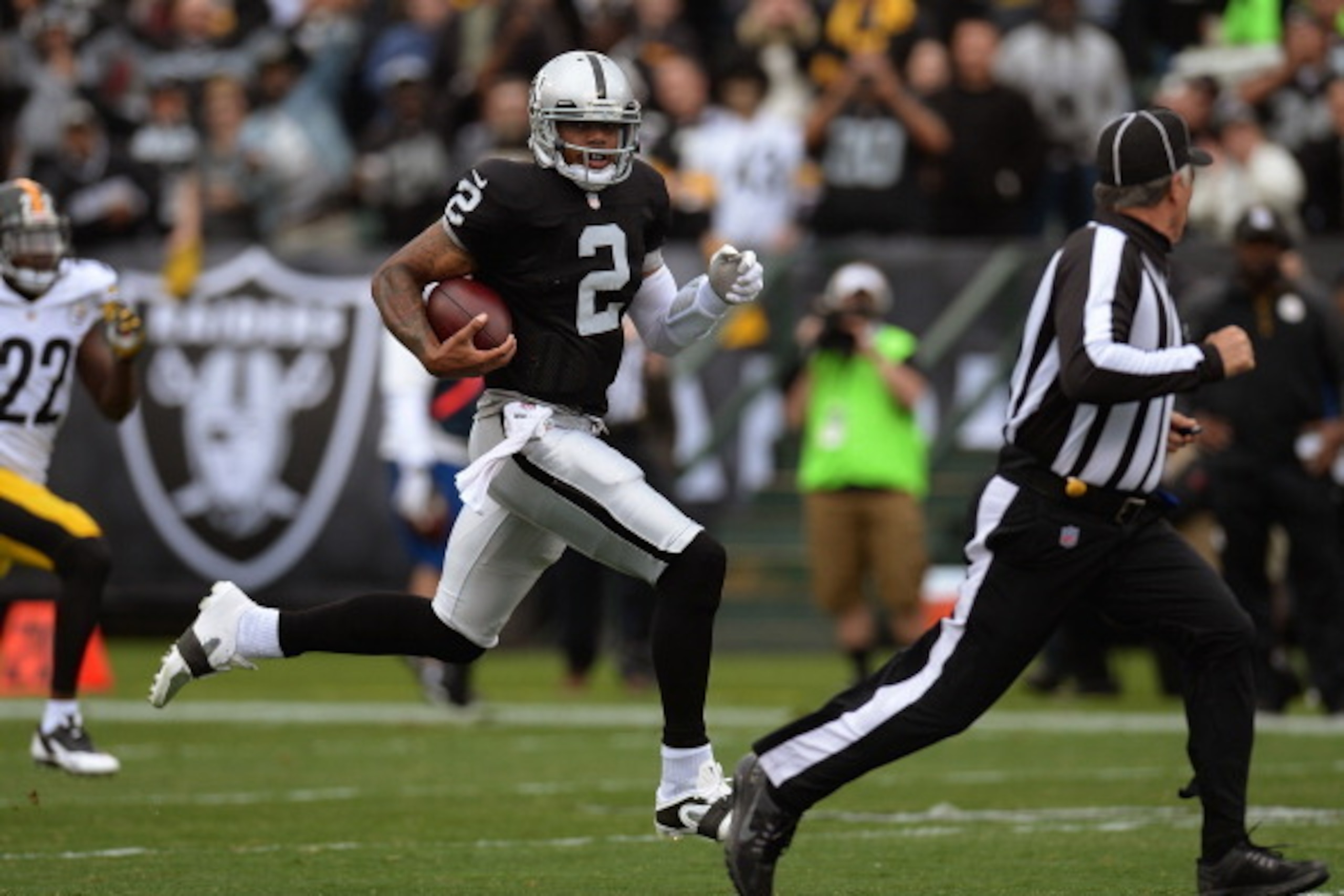 OAKLAND, CA - OCTOBER 27:  Terrelle Pryor #2 of the Oakland Raiders rushes ninety three yards for a touchdown on the first play of the game against the Pittsburgh Steelers at O.co Coliseum on October 27, 2013 in Oakland, California.  (Photo by Thearon W. 
