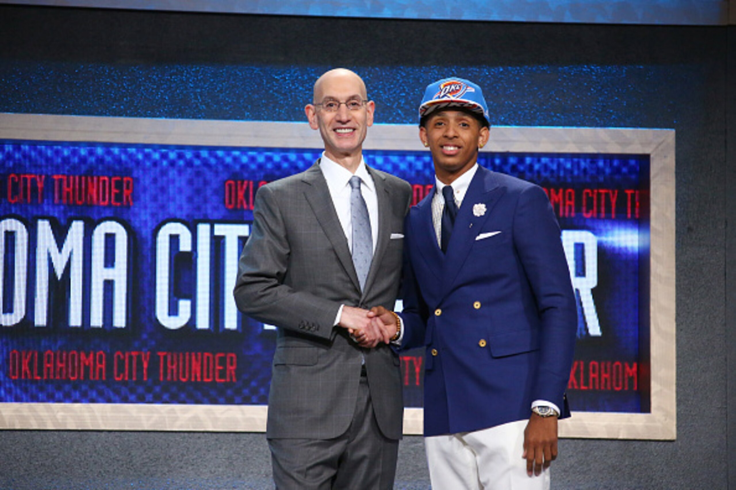 BROOKLYN, NY - JUNE 25: Cameron Payne shakes hands with NBA Commissioner Adam Silver after being selected number fourteen overall by the Oklahoma City Thunder during the 2015 NBA Draft on June 25, 2015 at Barclays Center in Brooklyn, New York. NOTE TO USE