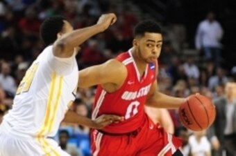 Mar 19, 2015; Portland, OR, USA; Ohio State Buckeyes guard D'Angelo Russell (0) dribbles against Virginia Commonwealth Rams guard/forward Treveon Graham (21) during the first half in the second round of the 2015 NCAA Tournament at Moda Center. Mandatory C