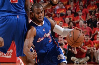 HOUSTON, TX - MAY 17:  Chris Paul #3 of the Los Angeles Clippers drives to the basket against the Houston Rockets in Game Seven of the Western Conference Semifinals during the 2015 NBA Playoffs on May 17, 2015 at the Toyota Center in Houston, Texas. NOTE 