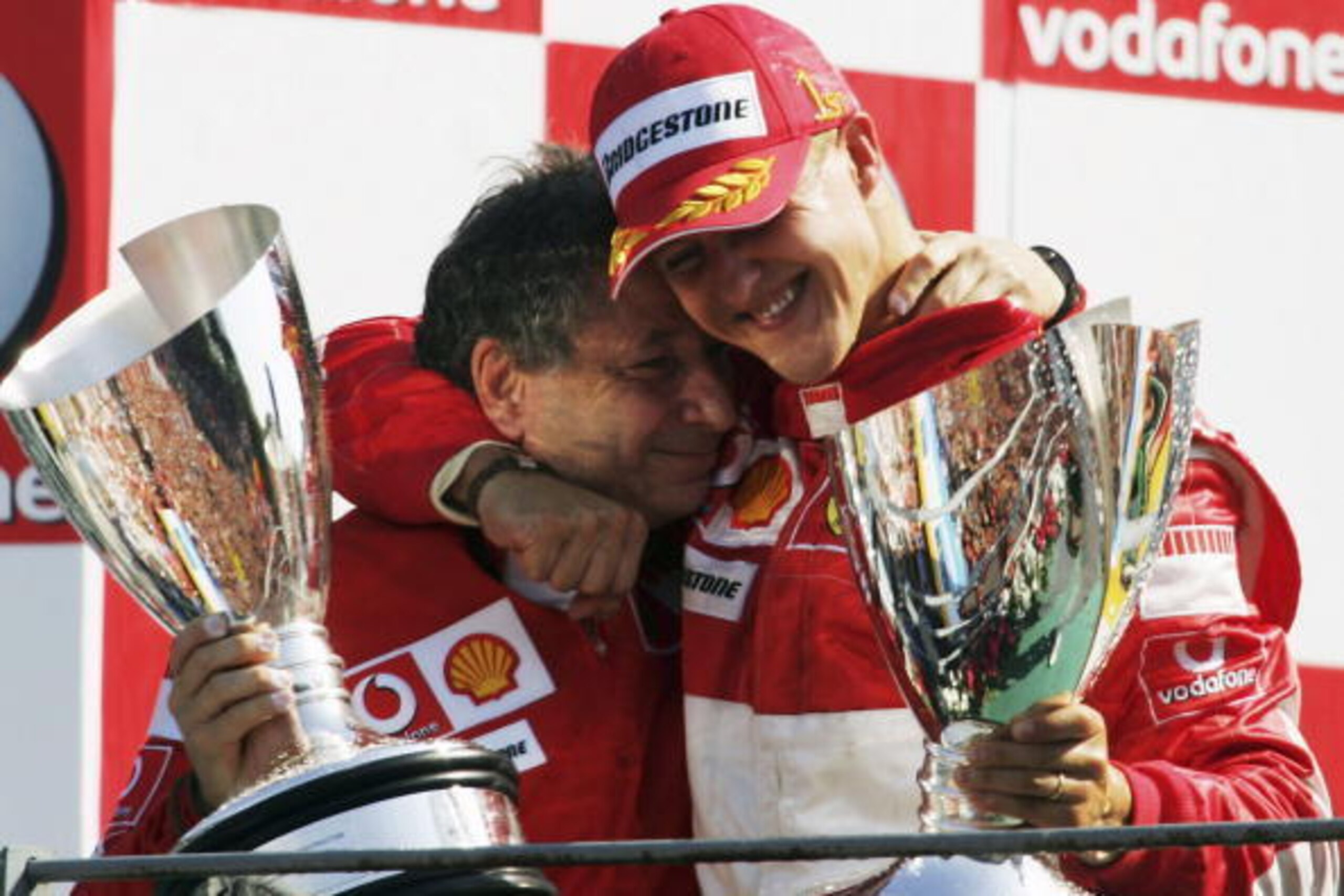MONZA, ITALY - SEPTEMBER 10:  Michael Schumacher of Germany and Ferrari celebrates with Jean Todt after winning the Italian Formula One Grand Prix at the Autodromo Nazionale Monza on September 10, 2006 in Monza, Italy.  (Photo by Bryn Lennon/Getty Images)