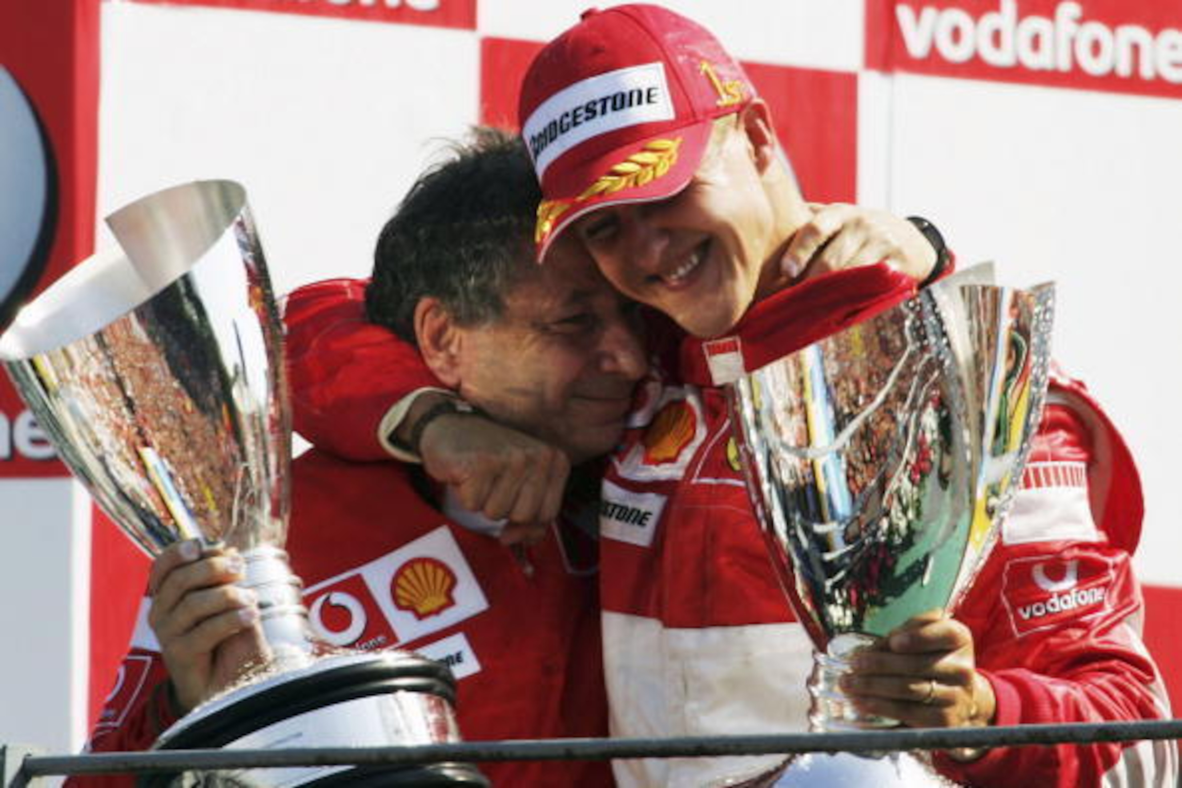 MONZA, ITALY - SEPTEMBER 10:  Michael Schumacher of Germany and Ferrari celebrates with Jean Todt after winning the Italian Formula One Grand Prix at the Autodromo Nazionale Monza on September 10, 2006 in Monza, Italy.  (Photo by Bryn Lennon/Getty Images)