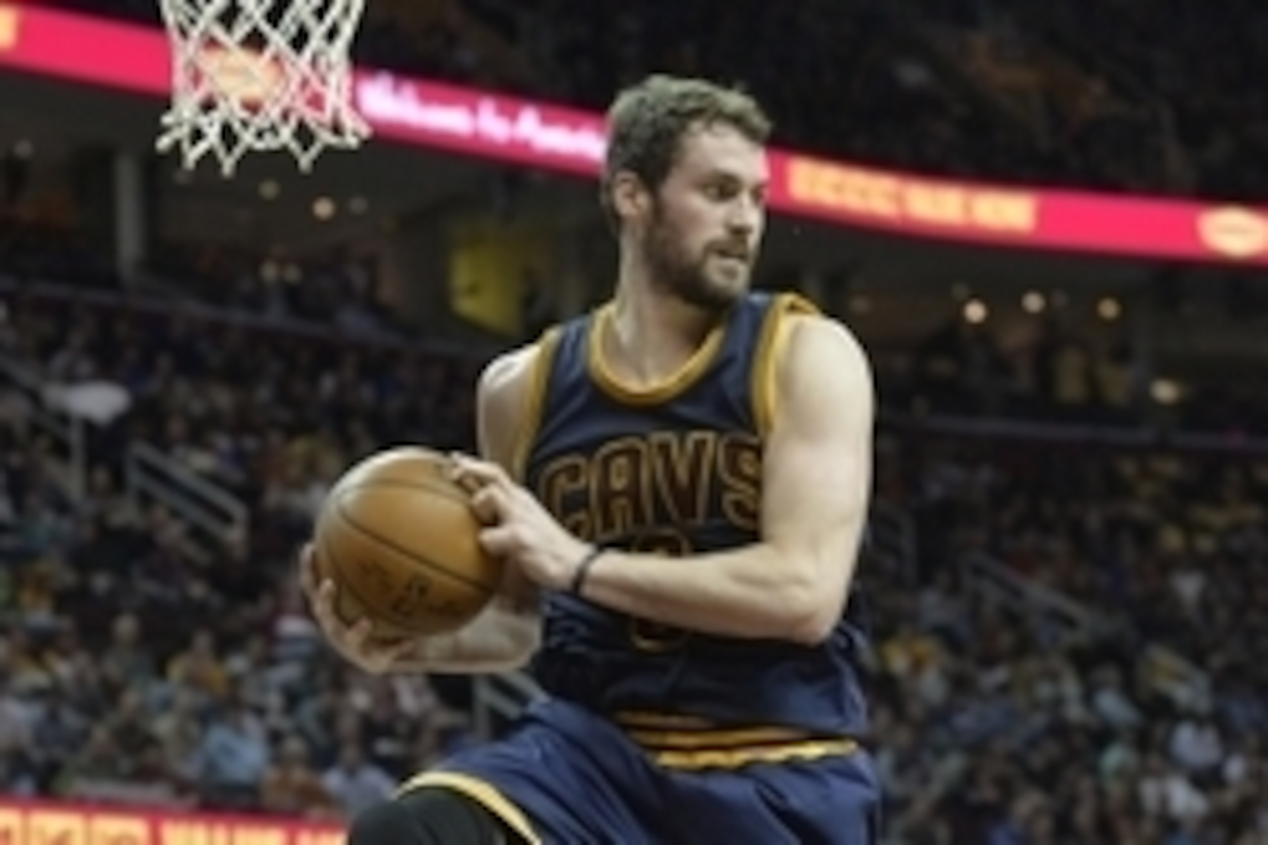 Apr 10, 2015; Cleveland, OH, USA; Cleveland Cavaliers forward Kevin Love (0) rebounds in the second quarter against the Boston Celtics at Quicken Loans Arena. Mandatory Credit: David Richard-USA TODAY Sports