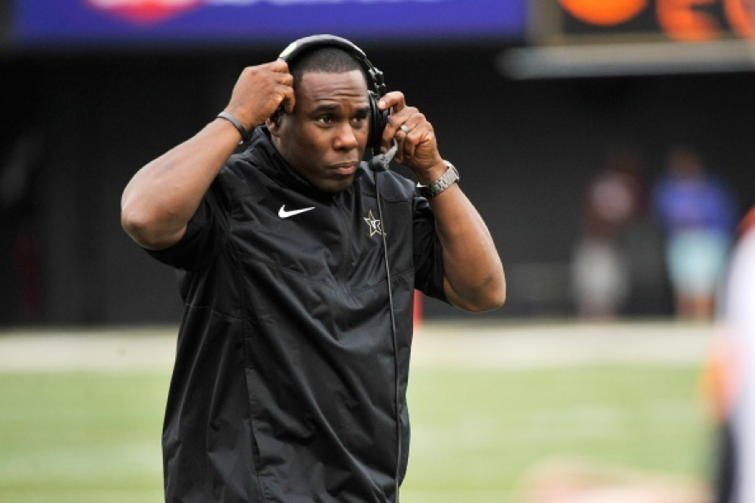 NASHVILLE, TN - SEPTEMBER 13:  Head coach Derek Mason of the Vanderbilt Commodores coaches against the University of Massachusetts Minutemen at Vanderbilt Stadium on September 13, 2014 in Nashville, Tennessee.  (Photo by Frederick Breedon/Getty Images)