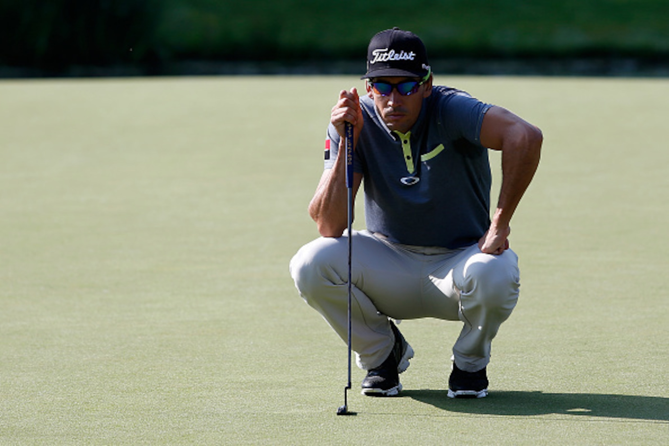 MUNICH, GERMANY - JUNE 26: Rafa Cabrera Bello of Spain lines-up a putt during the BMW International Open day two at the Eichenried Golf Club on June 26, 2015 in Munich, Germany. (Photo by Paul Thomas/Getty Images)