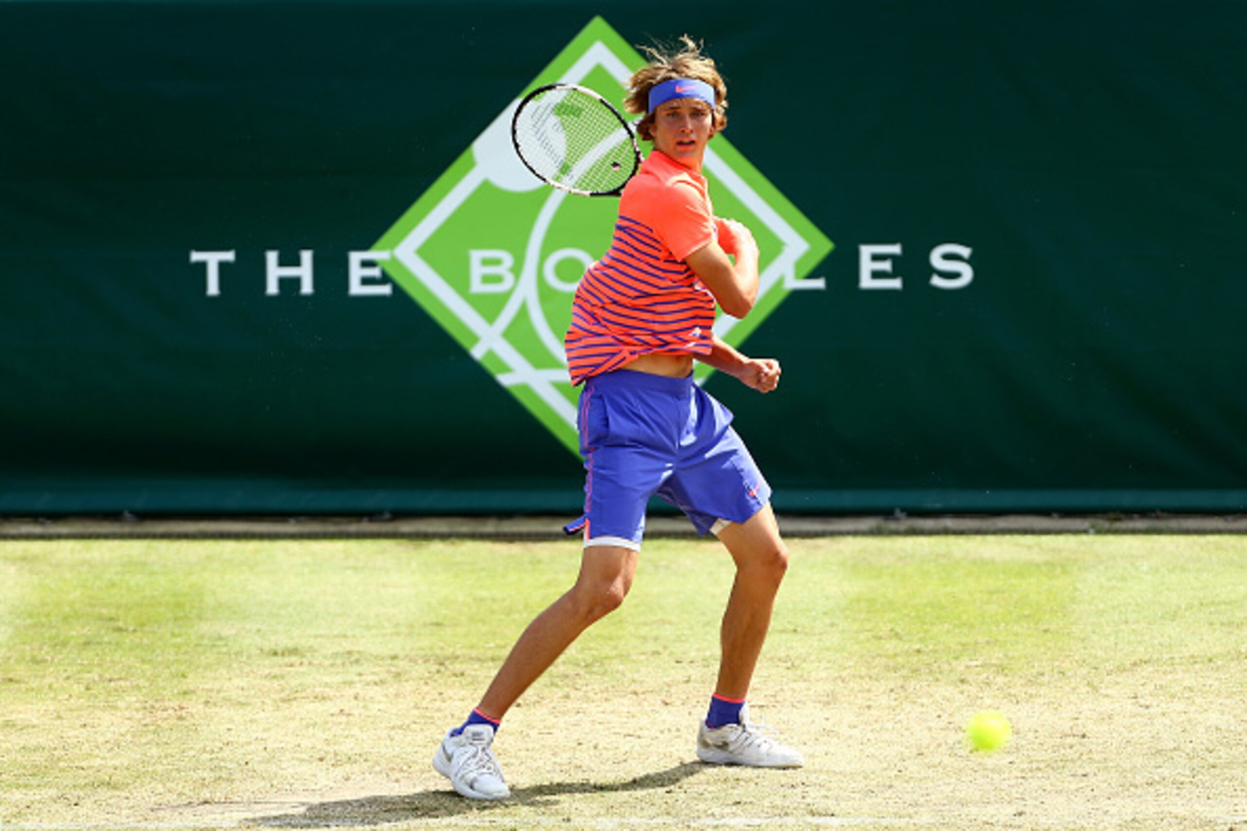 STOKE POGES, ENGLAND - JUNE 26:  Alexander Zverev of Germany plays a forehand during his match againstNovak Djokovic of Serbia during Day 4 of The Boodles Tennis Event at Stoke Park on June 26, 2015 in Stoke Poges, England.  (Photo by Jordan Mansfield/Get