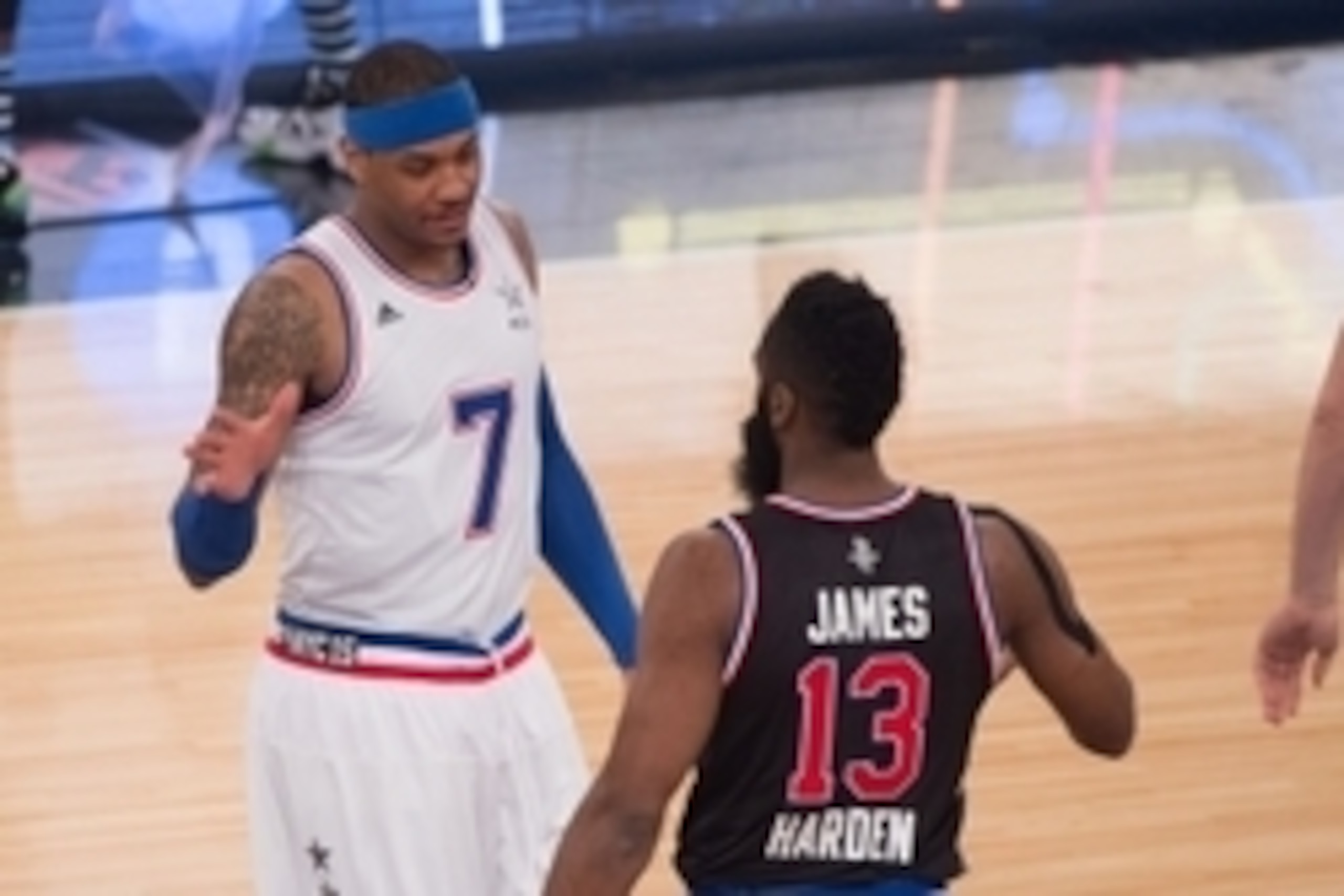 February 15, 2015; New York, NY, USA; Eastern Conference forward Carmelo Anthony of the New York Knicks (7) shakes hands with Western Conference guard James Harden of the Houston Rockets (13) before the 2015 NBA All-Star Game at Madison Square Garden.Mand
