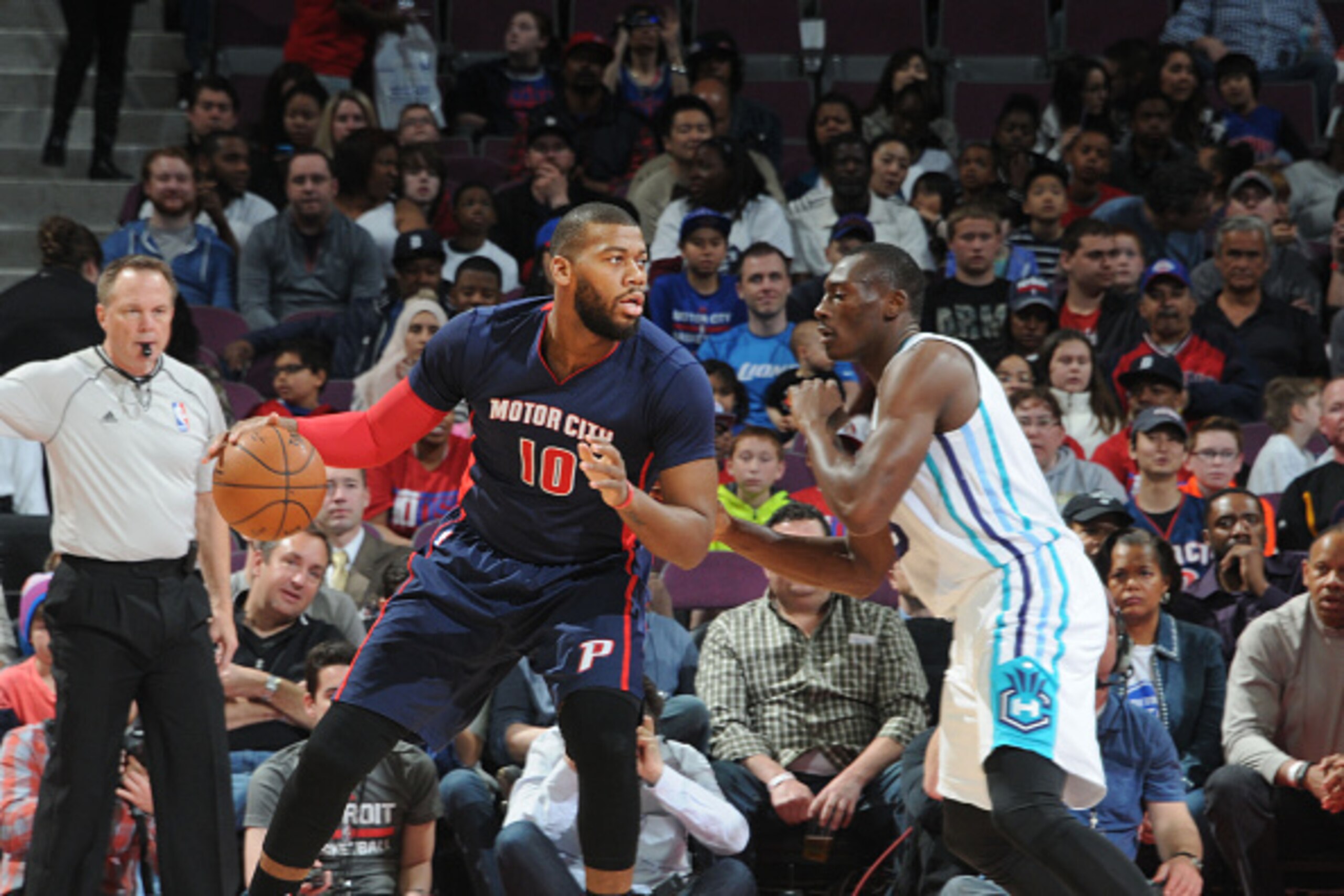 DETROIT, MI - APRIL 12: Greg Monroe #10 of the Detroit Pistons drives to the basket against the Charlotte Hornets during the game on April 12, 2015 at The Palace of Auburn in Detroit, Michigan. NOTE TO USER: User expressly acknowledges and agrees that, by