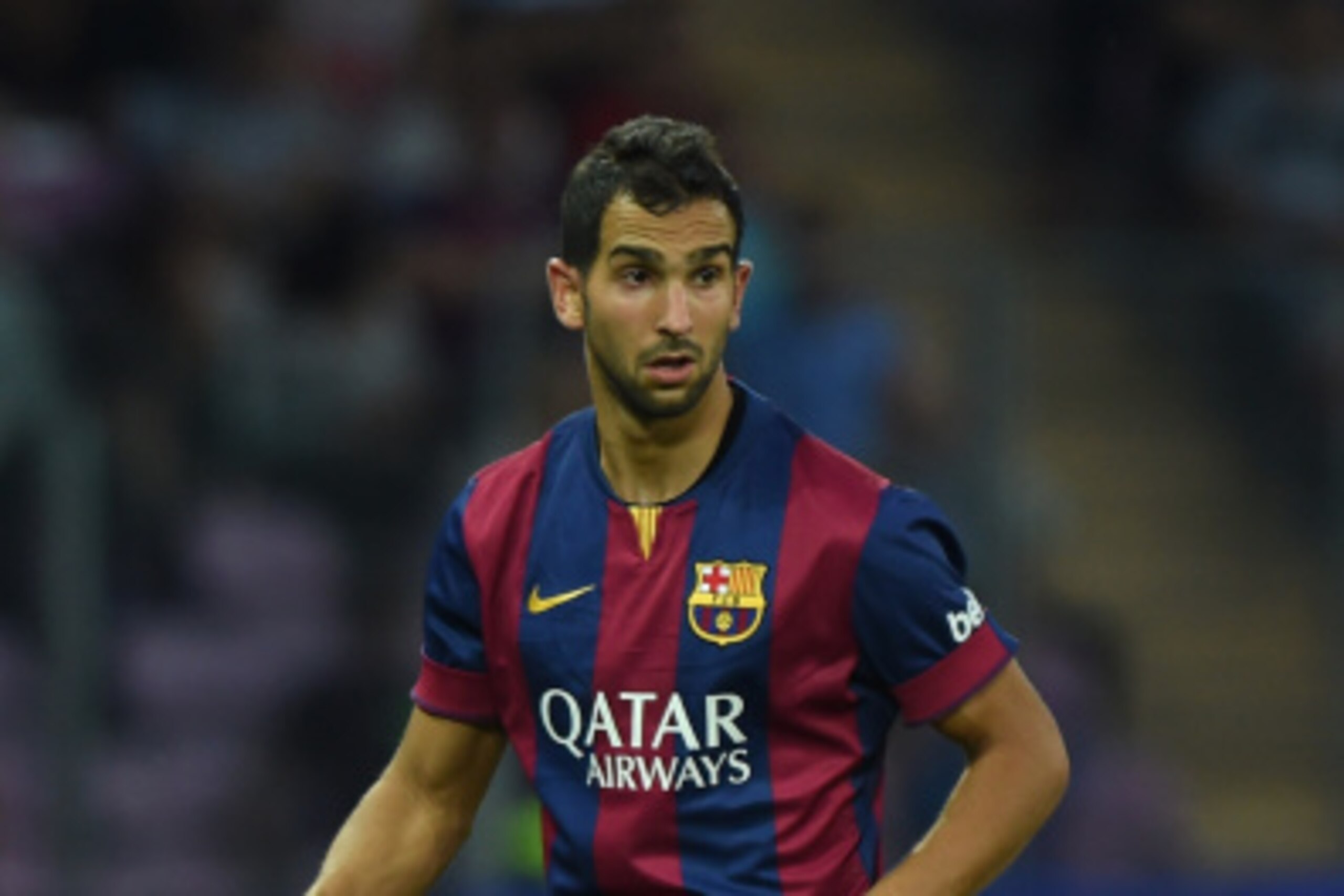 GENEVA, SWITZERLAND - AUGUST 06:  Martin Montoya of FC Barcelona in action during the pre-season friendly match between FC Barcelona and SSC Napoli on August 6, 2014 in Geneva, Switzerland.  (Photo by Valerio Pennicino/Getty Images)