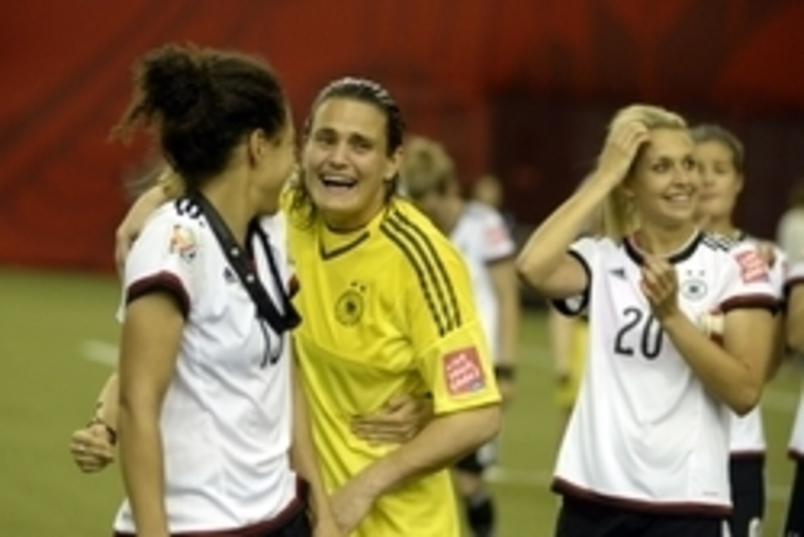 Jun 26, 2015; Montreal, Quebec, CAN; Germany forward Celia Sasic (13) and goalkeeper Nadine Angerer (1) celebrate after defeating France in the quarterfinals of the FIFA 2015 Women's World Cup at Olympic Stadium. Mandatory Credit: Eric Bolte-USA TODAY Spo