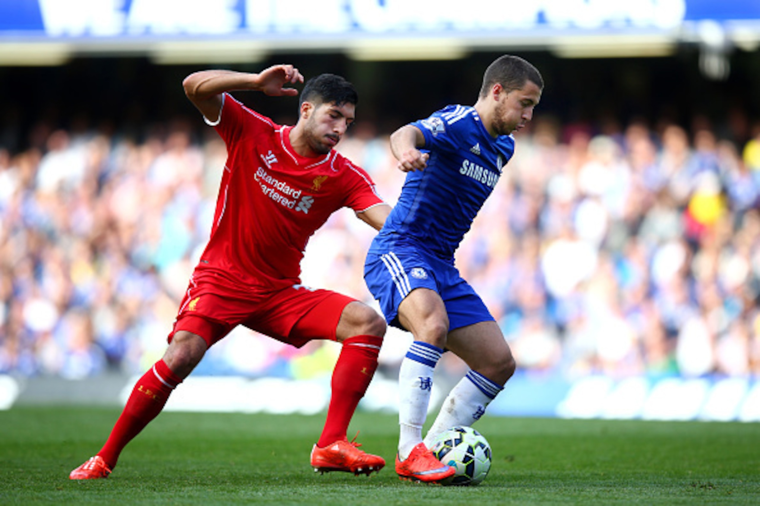LONDON, ENGLAND - MAY 10:  Eden Hazard of Chelsea is challenged by Emre Can of Liverpool during the Barclays Premier League match between Chelsea and Liverpool at Stamford Bridge on May 10, 2015 in London, England.  (Photo by Clive Rose/Getty Images)