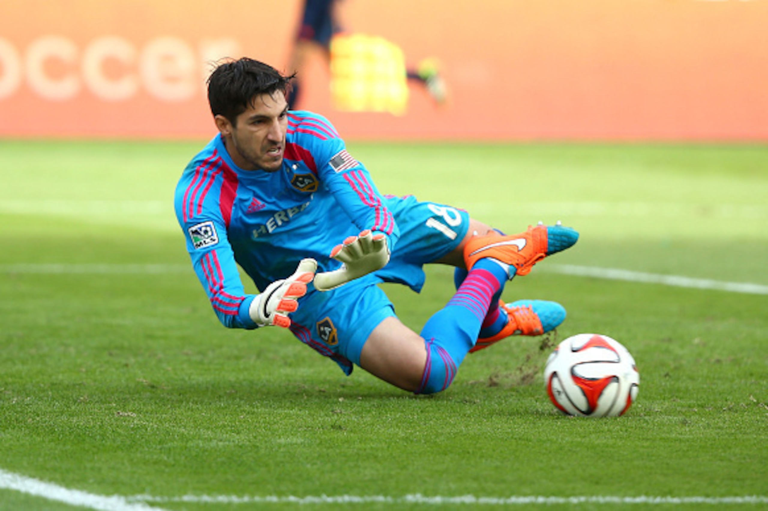 LOS ANGELES, CA - DECEMBER 07:  Goalkeeper Jaime Penedo #18 of the Los Angeles Galaxy makes a save in the second half of regulation time during 2014 MLS Cup at StubHub Center on December 7, 2014 in Los Angeles, California. The Galaxy defeated the Revoluti