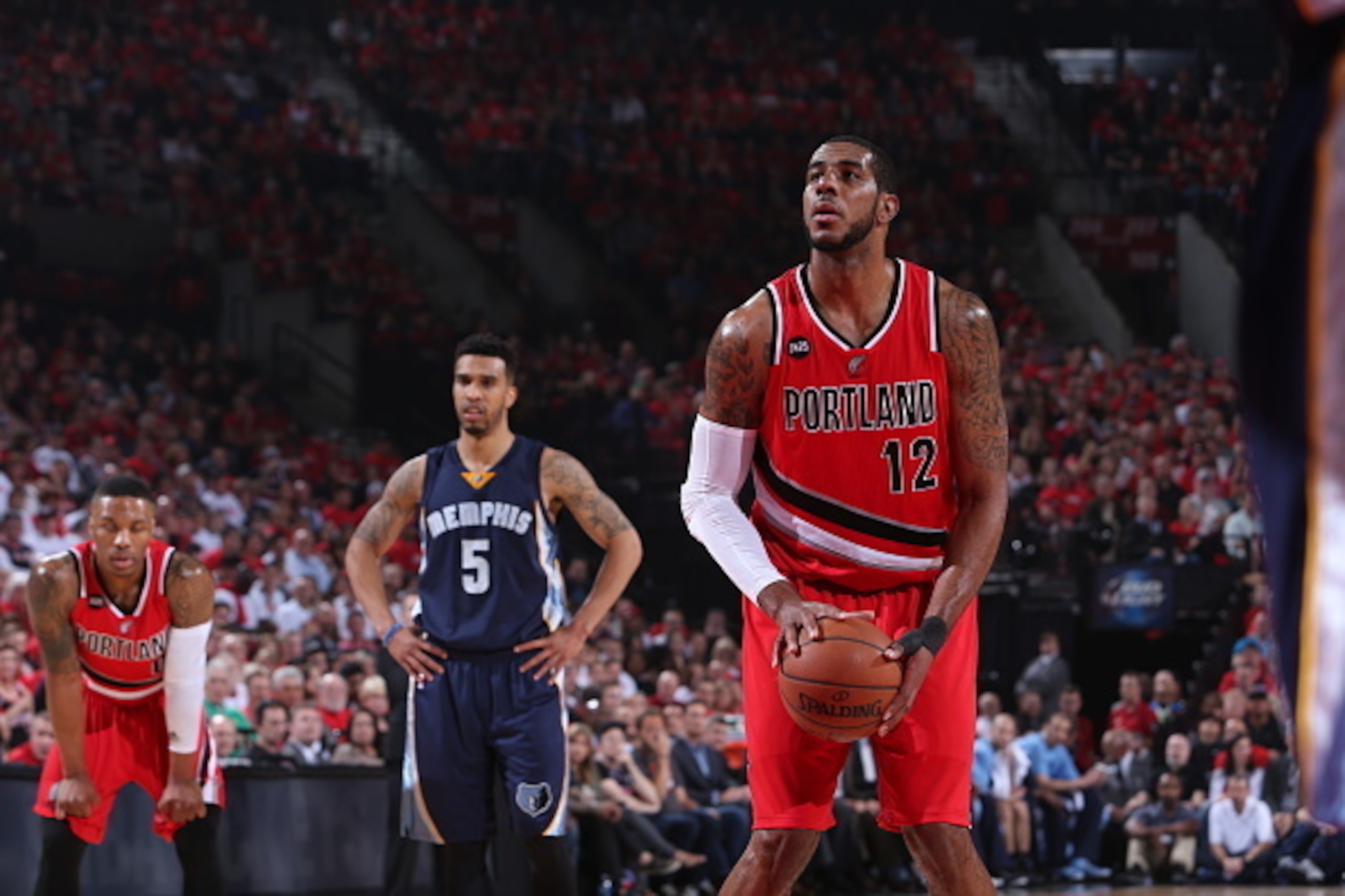 PORTLAND, OR - APRIL 25:  LaMarcus Aldridge #12 of the Portland Trail Blazers prepares to shoot a free throw against the Memphis Grizzlies in Game Three of the Western Conference Quarterfinals during the 2015 NBA Playoffs on April 25, 2015 at the Moda Cen