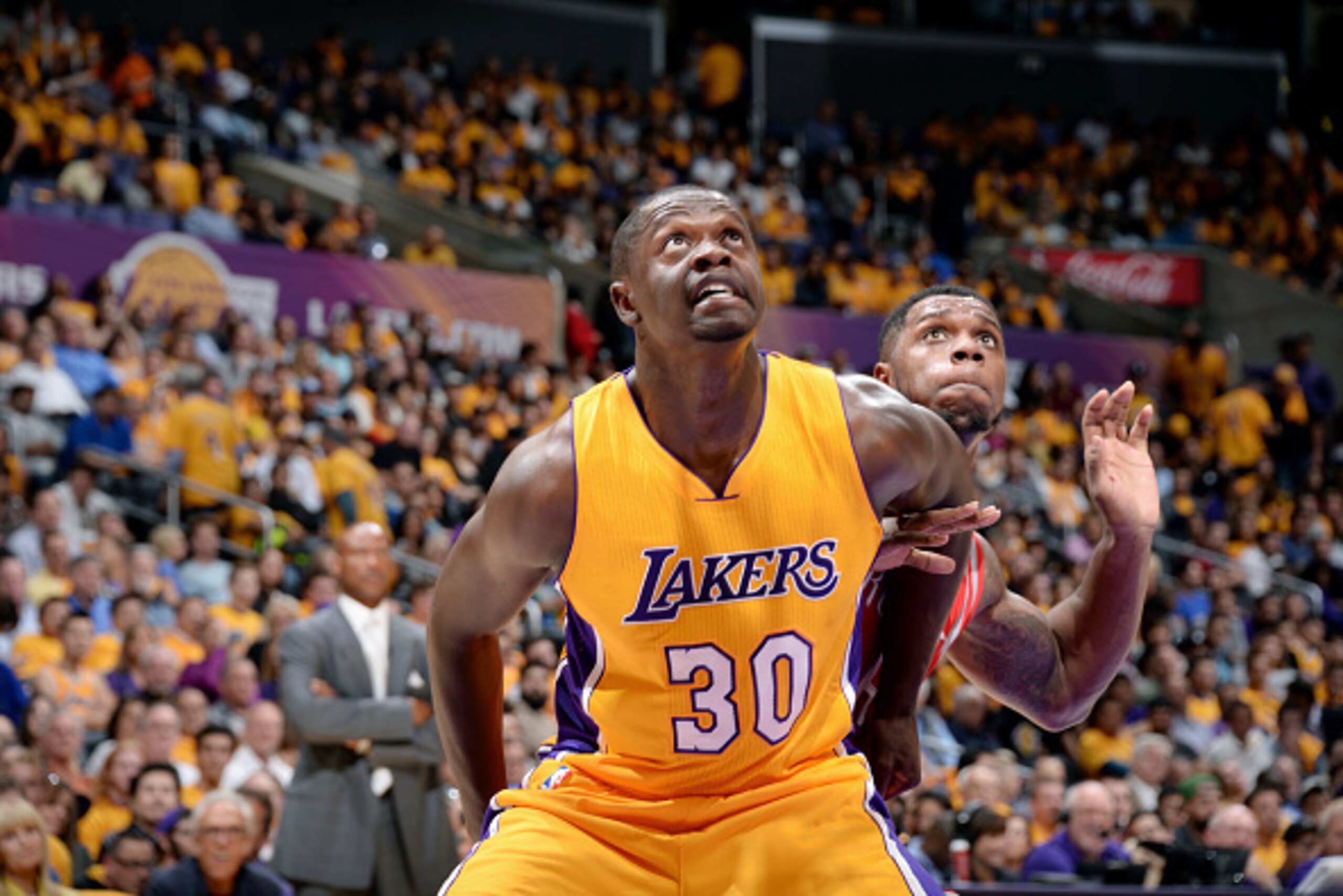 LOS ANGELES, CA - OCTOBER 28: Julius Randle #30 of the Los Angeles Lakers battles for position against the Houston Rockets on October 28, 2014 at the Staples Center in Los Angeles, California. NOTE TO USER: User expressly acknowledges and agrees that, by 