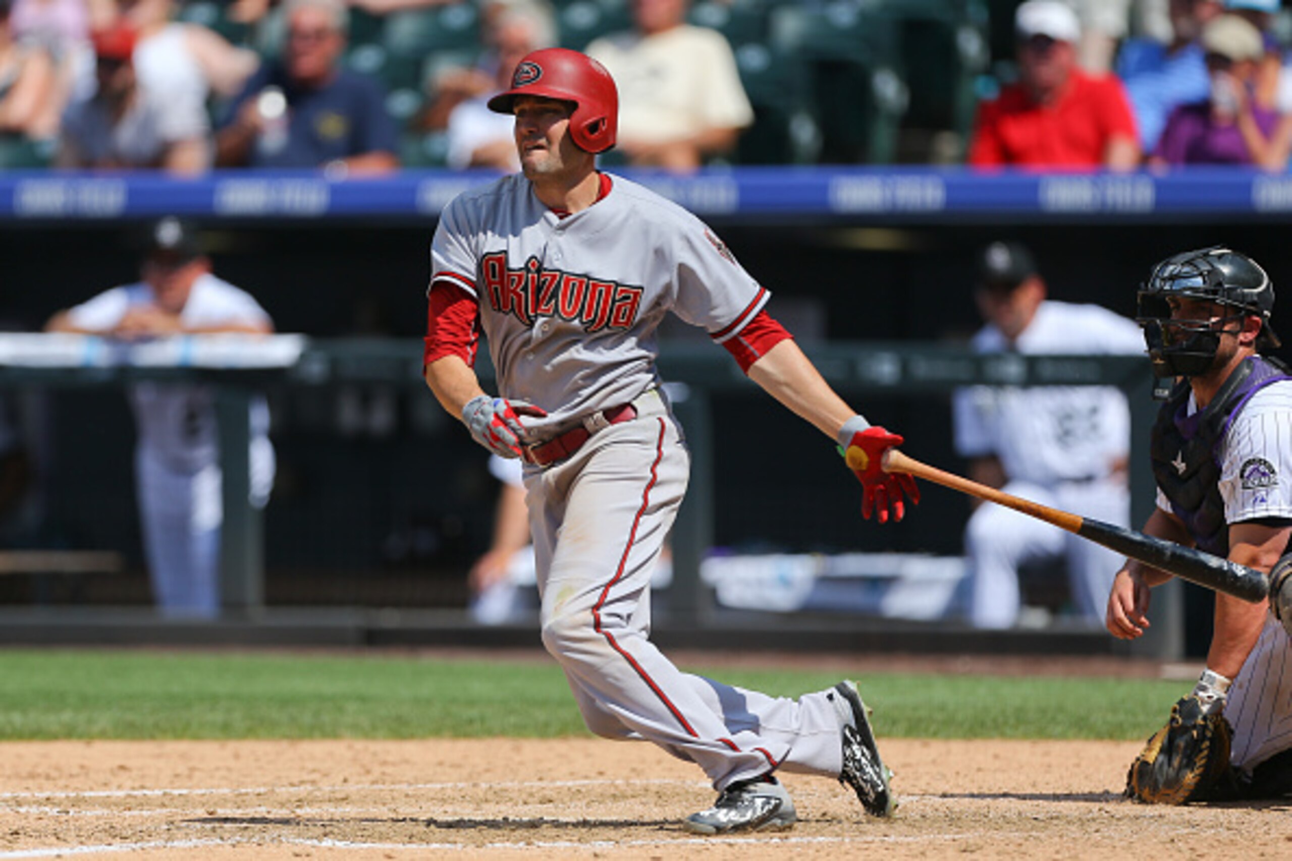 DENVER, CO - JUNE 25:  A.J. Pollock #11 of the Arizona Diamondbacks watches his RBI double during the seventh inning against the Colorado Rockies at Coors Field on June 25, 2015 in Denver, Colorado. The Rockies defeated the Diamondbacks 6-4. (Photo by Jus
