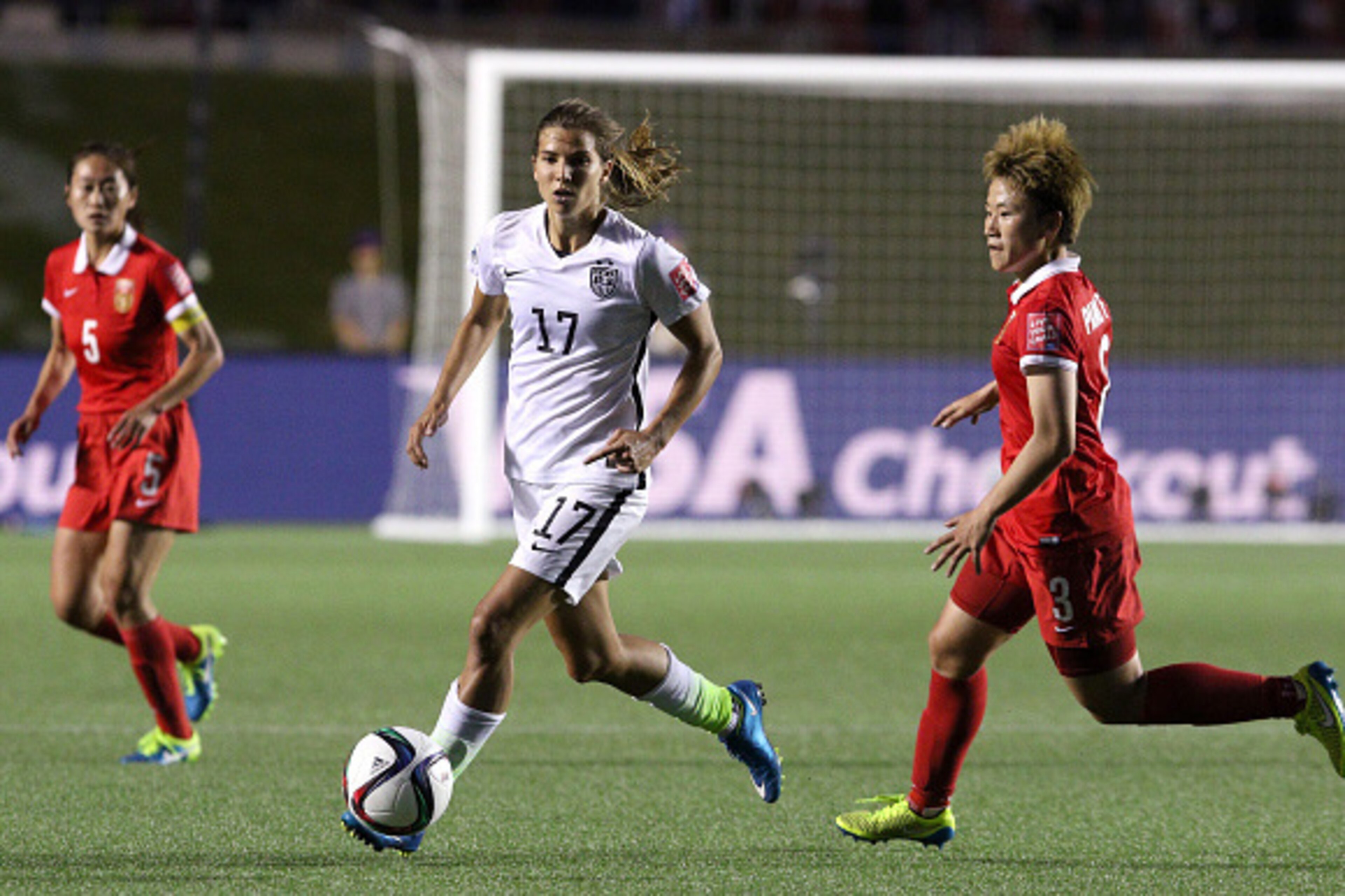 OTTAWA, ON - JUNE 26: Tobin Heath #17 of the United States controls the ball against Pang Fengyue #3 of China in the second half in the FIFA Women's World Cup 2015 Quarter Final match at Lansdowne Stadium on June 26, 2015 in Ottawa, Canada.  (Photo by Jan