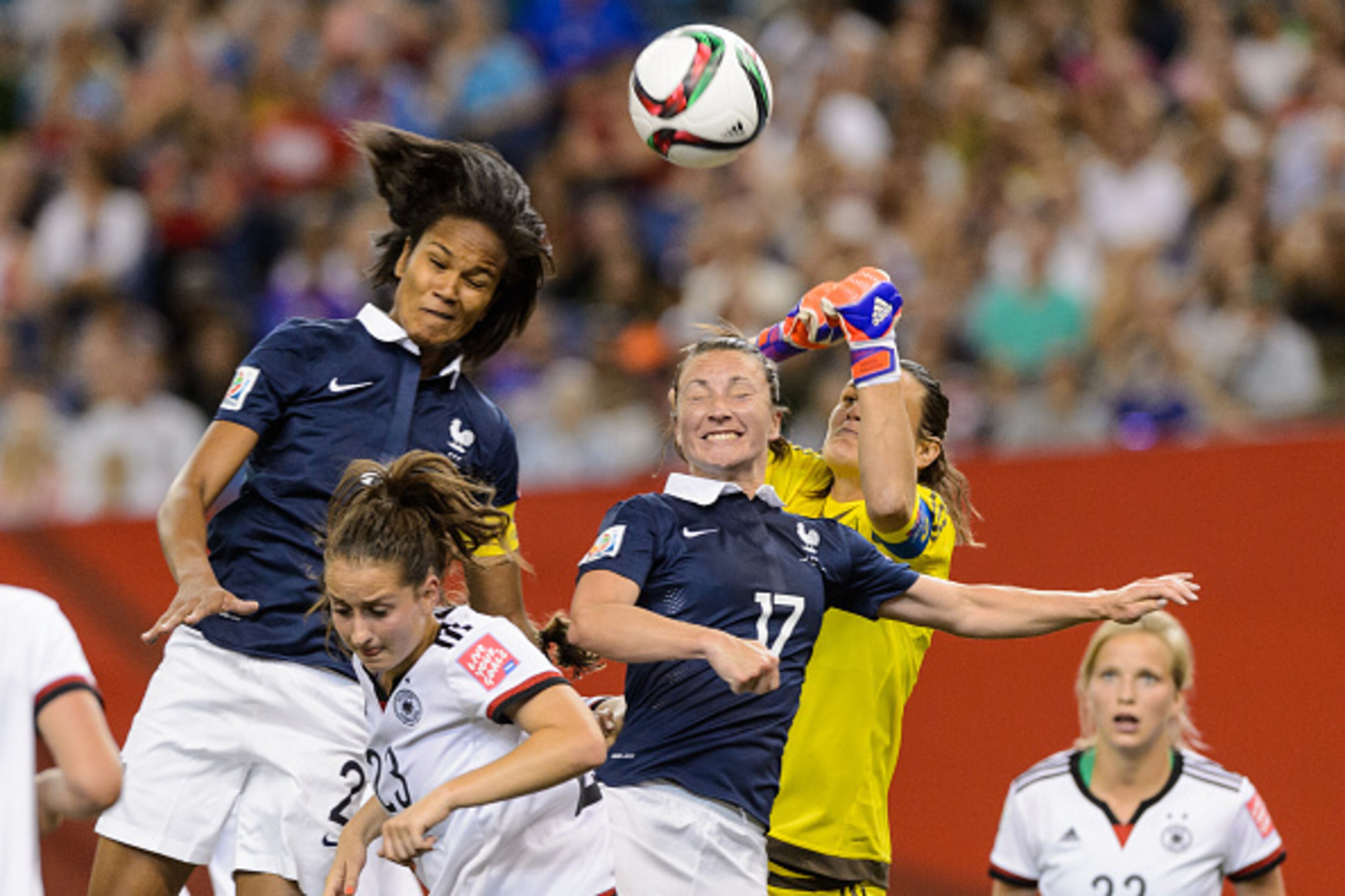 MONTREAL, QC - JUNE 26: Nadine Angerer #1 of Germany and Gaetane Thiney #17 of France jump for the ball during the 2015 FIFA Women's World Cup quarter final match at Olympic Stadium on June 26, 2015 in Montreal, Quebec, Canada. Germany defeated France 5-4