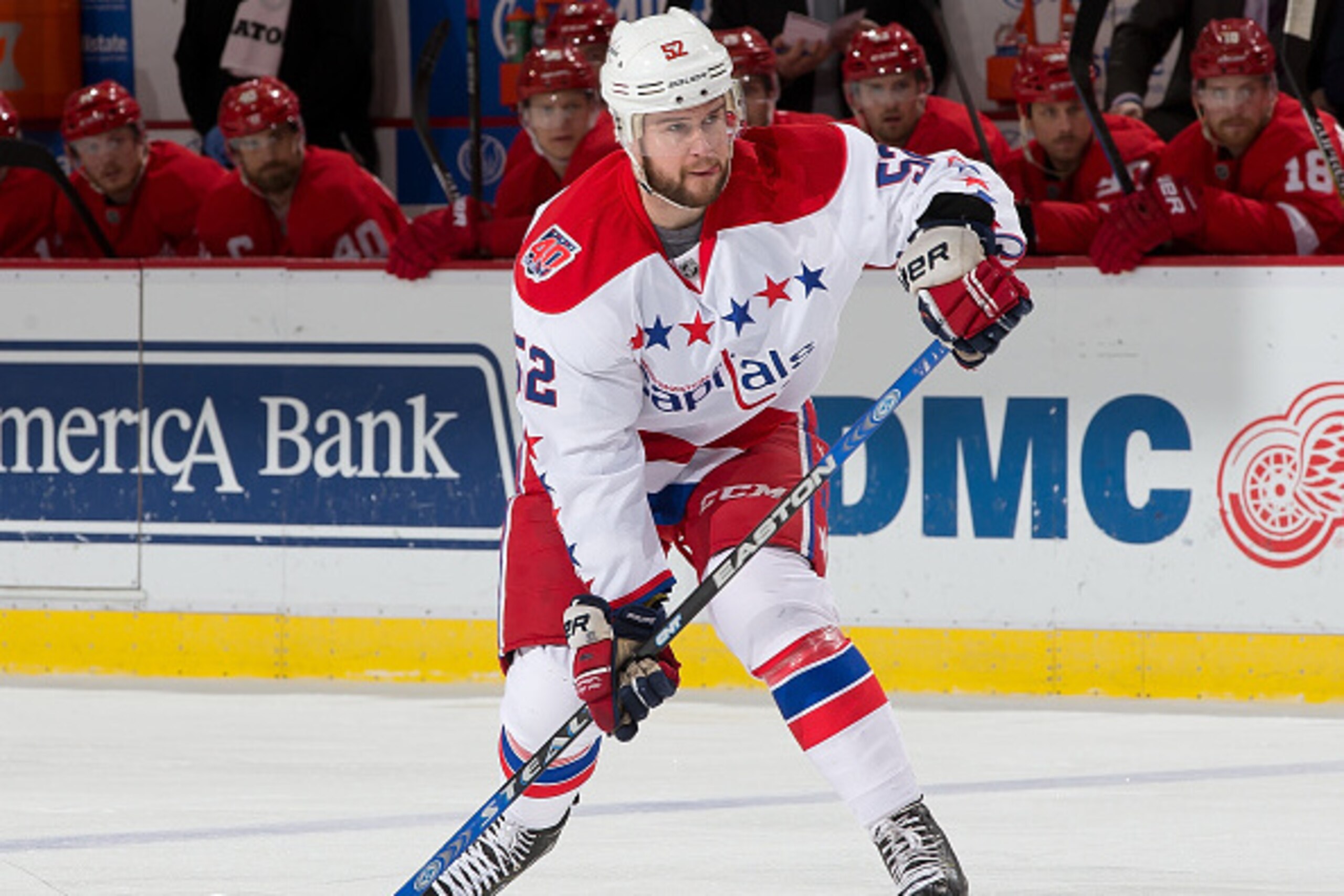 DETROIT, MI - APRIL 5: Mike Green #52 of the Washington Capitals shoots the puck during a NHL game against the Detroit Red Wings on April 5, 2015 at Joe Louis Arena in Detroit, Michigan. The Capitals defeated the Wings 2-1. (Photo by Dave Reginek/NHLI via