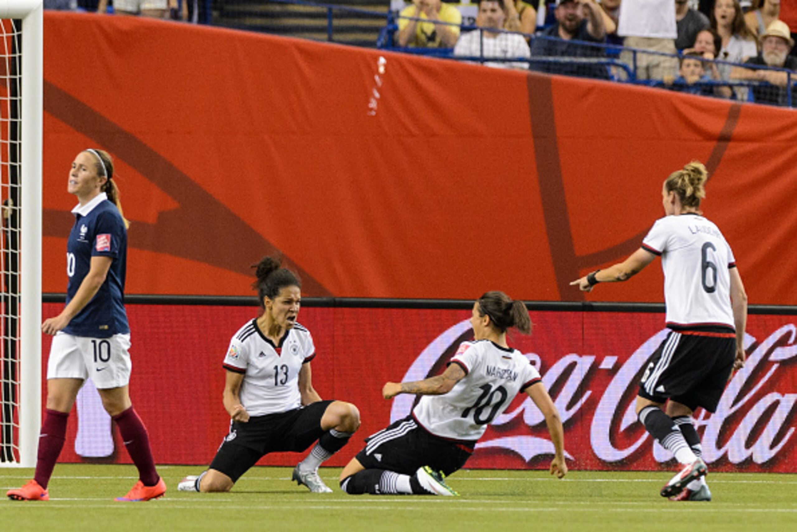 MONTREAL, QC - JUNE 26: Celia Sasic #13 of Germany celebrates her goal with teammates during the 2015 FIFA Women's World Cup quarter final match against France at Olympic Stadium on June 26, 2015 in Montreal, Quebec, Canada. (Photo by Minas Panagiotakis MONTREAL, QC - JUNE 26: Celia Sasic #13 of Germany celebrates her goal with teammates during the 2015 FIFA Women's World Cup quarter final match against France at Olympic Stadium on June 26, 2015 in Montreal, Quebec, Canada. (Photo by Minas Panagiotakis