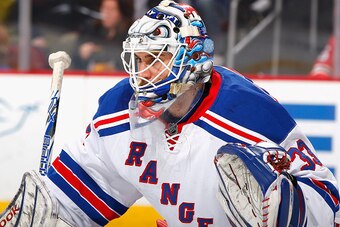 NEWARK, NJ - APRIL 07: Cam Talbot #33 of the New York Rangers looks on against the New Jersey Devils during the game at the Prudential Center on April 7, 2015 in Newark, New Jersey. (Photo by Andy Marlin/NHLI via Getty Images)