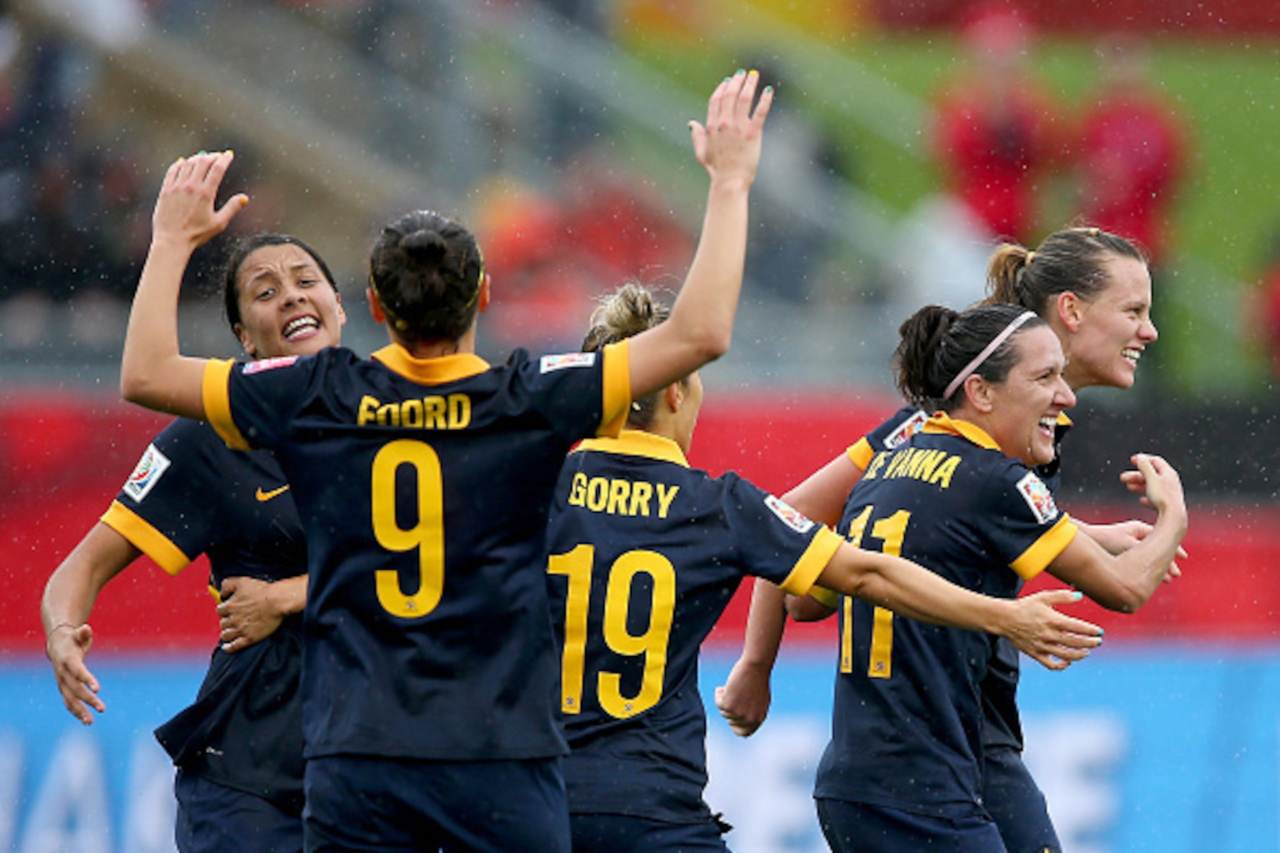MONCTON, NB - JUNE 21:  Australia celebrates the 1-0 win over Brazil during the FIFA Women's World Cup 2015 round of 16 match between Brazil and Australia at Moncton Stadium on June 21, 2015 in Moncton, Canada.  (Photo by Elsa/Getty Images)
