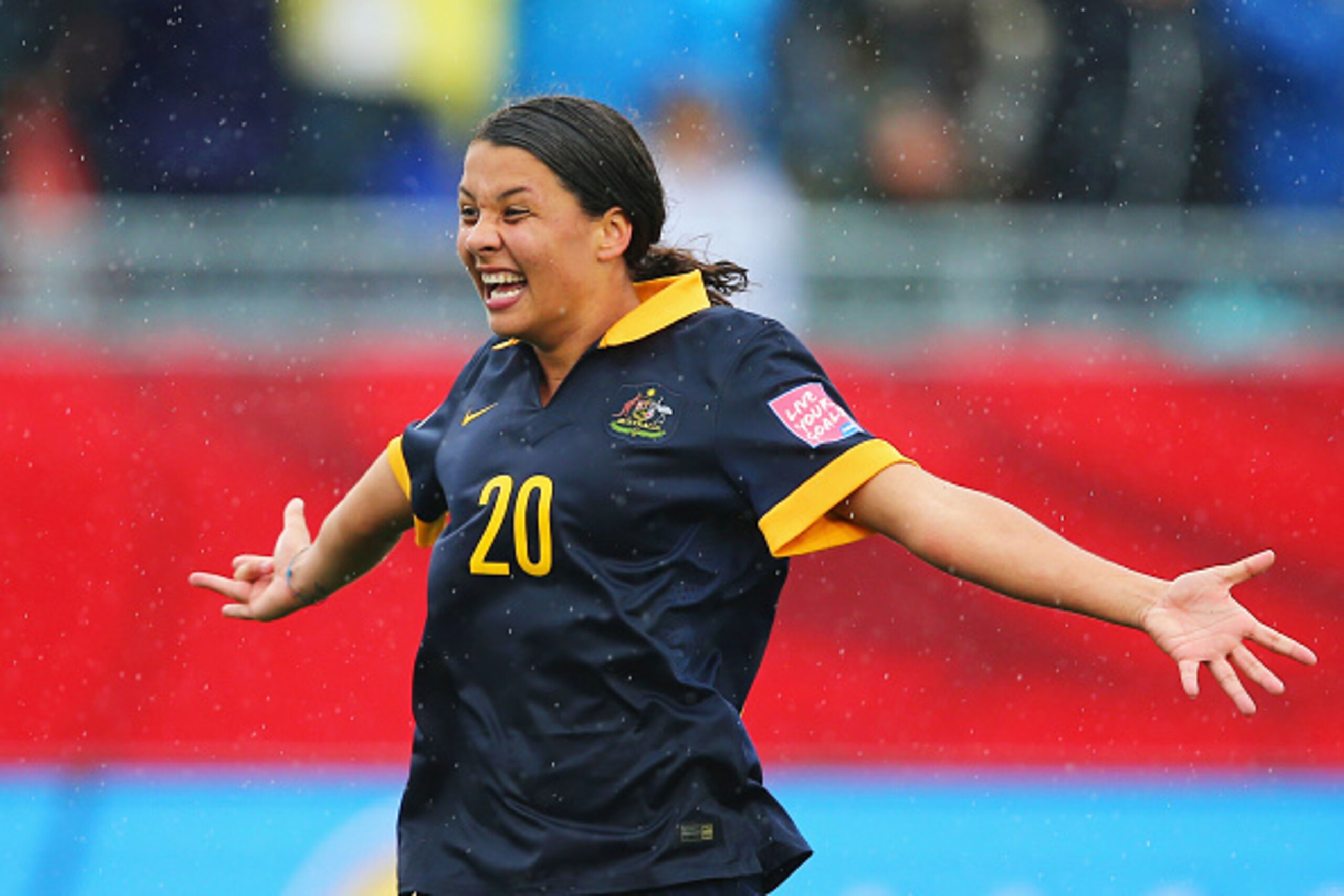 MONCTON, NB - JUNE 21:  Samantha Kerr of Australia celebrates victory after the FIFA Women's World Cup 2015 round of 16 match between Brazil and Australia at Moncton Stadium on June 21, 2015 in Moncton, Canada. Australia reach the quarter finals with a 1-