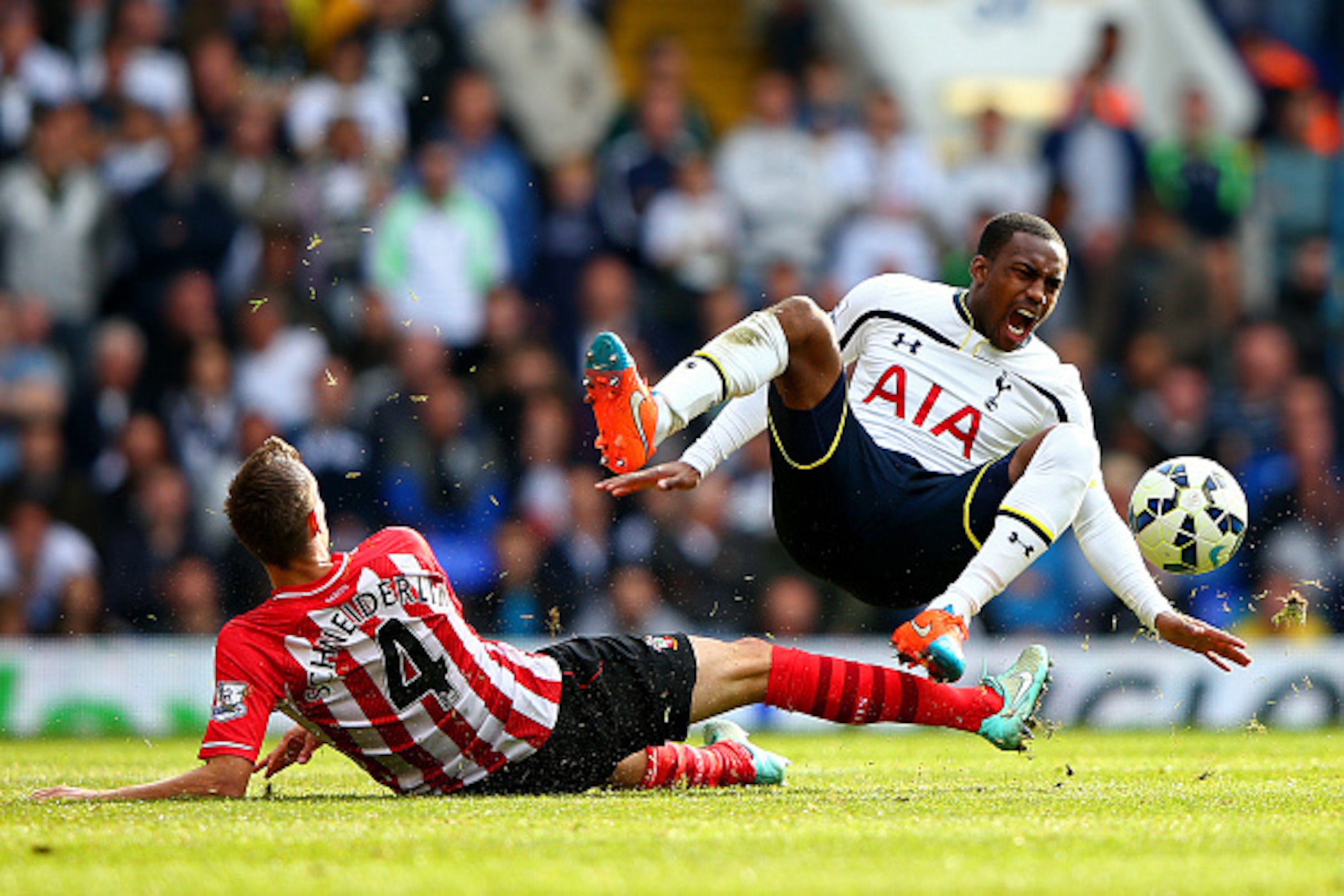 LONDON, ENGLAND - OCTOBER 05:  Morgan Schneiderlin of Southampton challenges Danny Rose of Spurs during the Barclays Premier League match between Tottenham Hotspur and Southampton at White Hart Lane on October 5, 2014 in London, England.  (Photo by Ian Wa