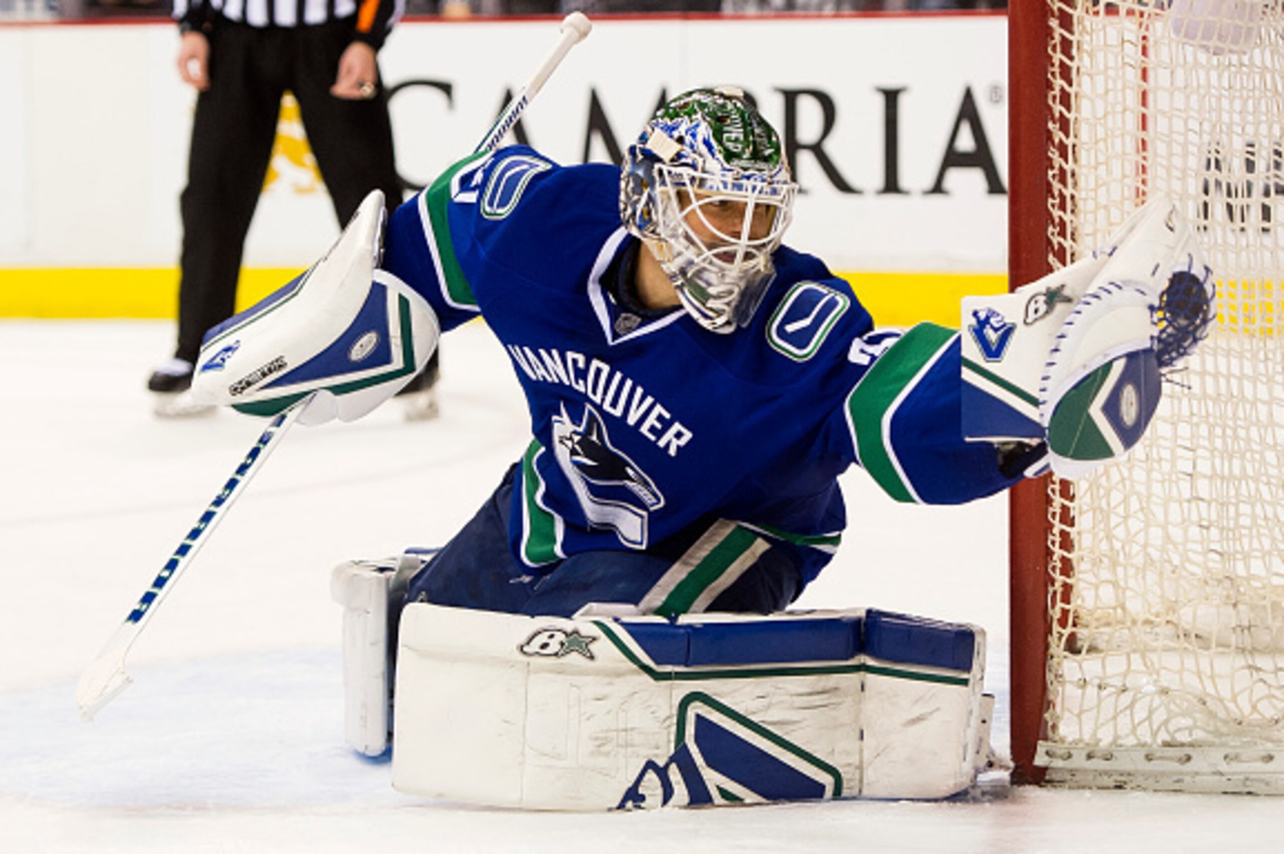 VANCOUVER, BC - MARCH 24: Goalie Eddie Lack #31 of the Vancouver Canucks makes a glove save in NHL action against the Winnipeg Jets on March 24, 2015 at Rogers Arena in Vancouver, British Columbia, Canada. (Photo by Rich Lam/Getty Images) VANCOUVER, BC - MARCH 24: Goalie Eddie Lack #31 of the Vancouver Canucks makes a glove save in NHL action against the Winnipeg Jets on March 24, 2015 at Rogers Arena in Vancouver, British Columbia, Canada. (Photo by Rich Lam/Getty Images)
