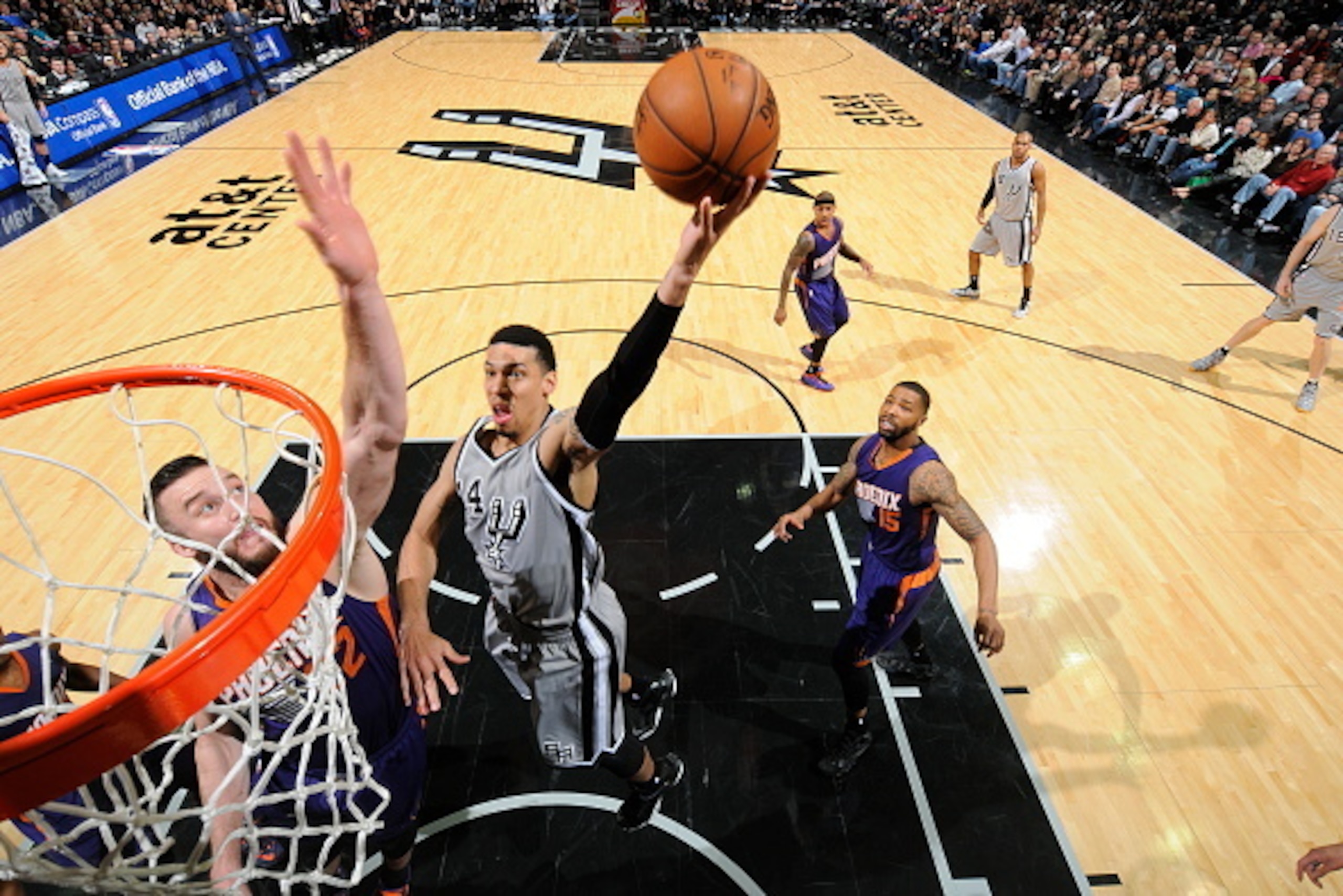 SAN ANTONIO, TX - JANUARY 9: Danny Green #14 of the San Antonio Spurs shoots against the Phoenix Suns at the AT&T Center on January 9, 2014 in San Antonio, Texas. NOTE TO USER: User expressly acknowledges and agrees that, by downloading and or using this 