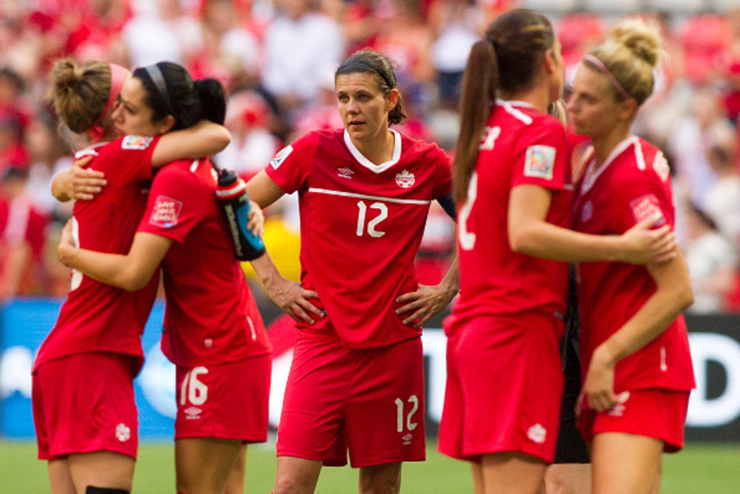VANCOUVER, BC - JUNE 27: Christine Sinclair #12 of Canada reacts after losing to England during the FIFA Women's World Cup Canada 2015 Quarter Final match between England and Canada June 27, 2015 at BC Place Stadium in Vancouver, British Columbia, Canada.