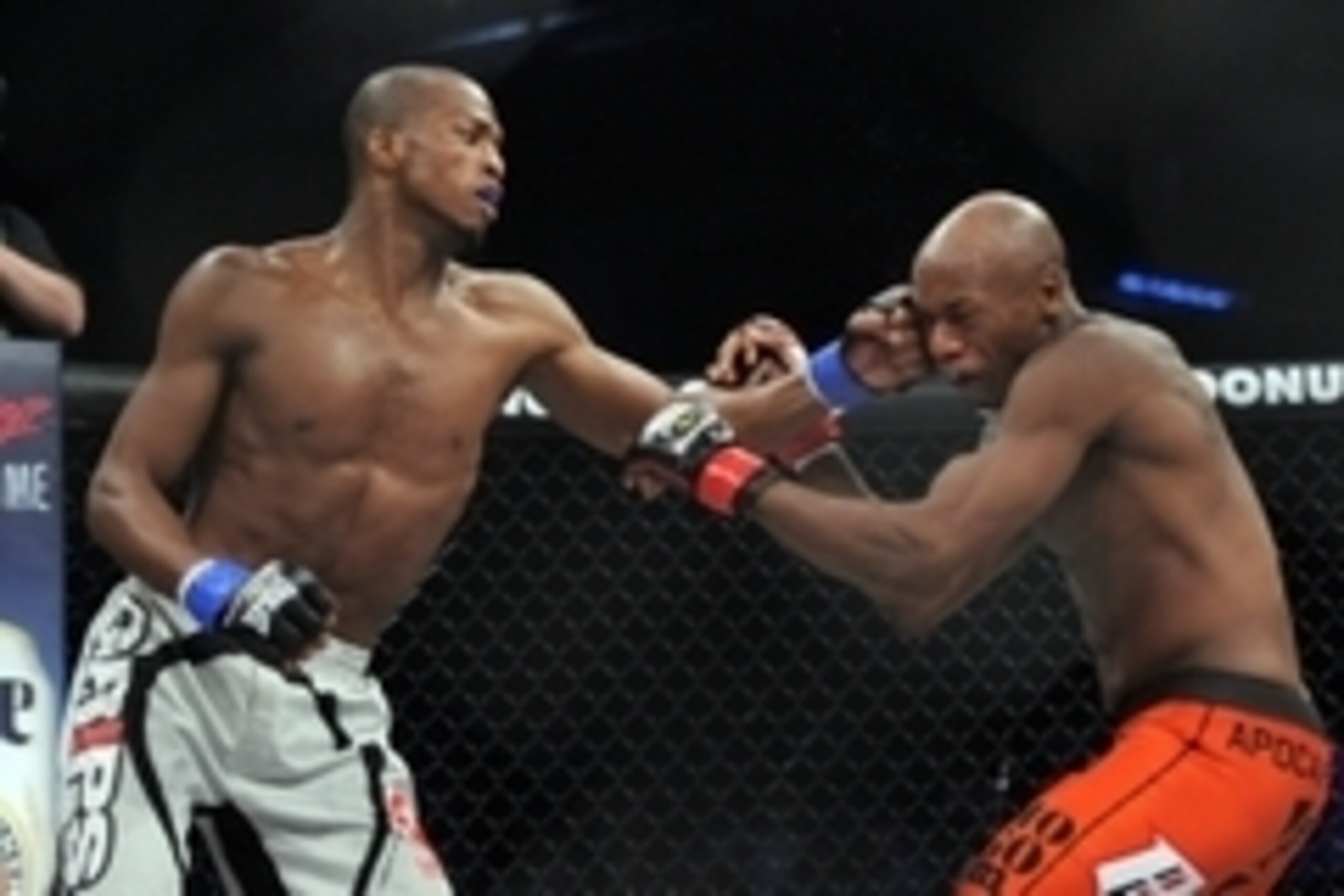 May 17, 2014; Southaven, MS, USA; Ricky Rainey (red gloves) fights against  Michael Page (blue gloves) during BFC 120 at Landers Center. Mandatory Credit: Justin Ford-USA TODAY Sports