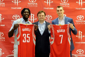 HOUSTON, TX- JUNE 27: 2015 NBA draft picks Montrezl Horrell, and Sam Dekker, and manager Daryl Morey pose for a portrait during a press conference on June 27, 2015 in Houston, TX. NOTE TO USER: User expressly acknowledges and agrees that, by downloading a