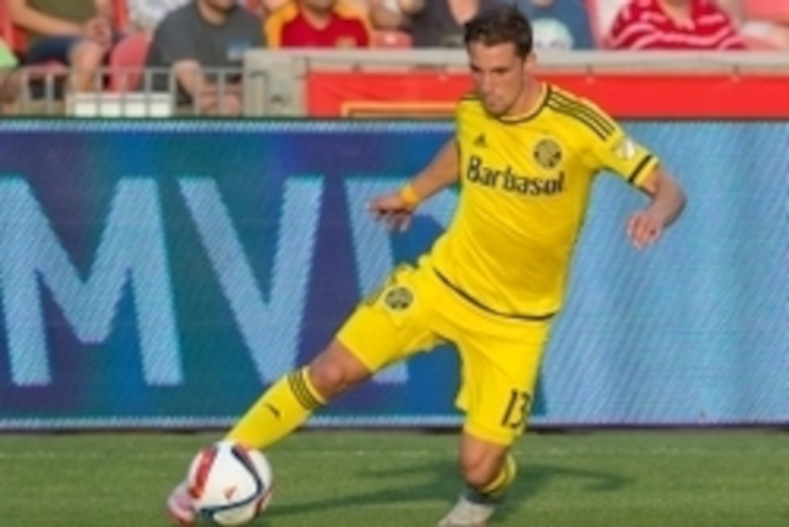 Jun 27, 2015; Sandy, UT, USA; Columbus Crew SC midfielder Ethan Finlay (13) dribbles the ball during the first half against Real Salt Lake at Rio Tinto Stadium. The match ended in a 2-2 draw. Mandatory Credit: Russ Isabella-USA TODAY Sports