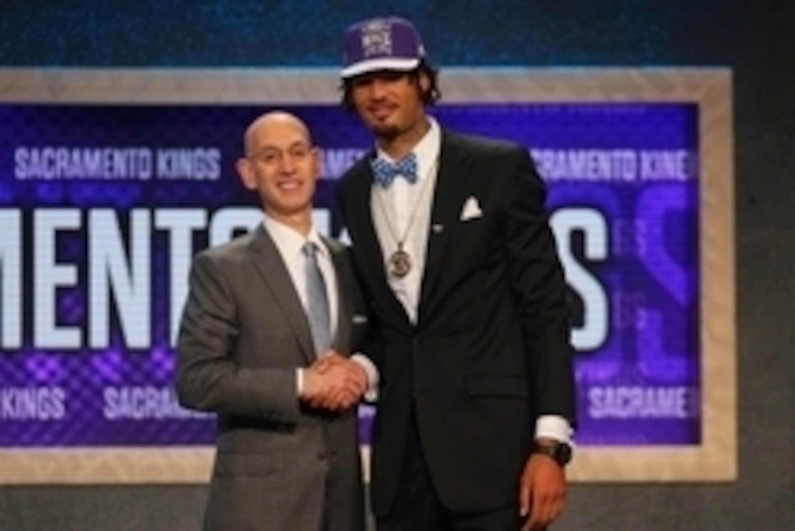 Jun 25, 2015; Brooklyn, NY, USA; Willie Cauley-Stein (Kentucky) greets NBA commissioner Adam Silver after being selected as the number six overall pick to the Sacramento Kings in the first round of the 2015 NBA Draft at Barclays Center. Mandatory Credit: