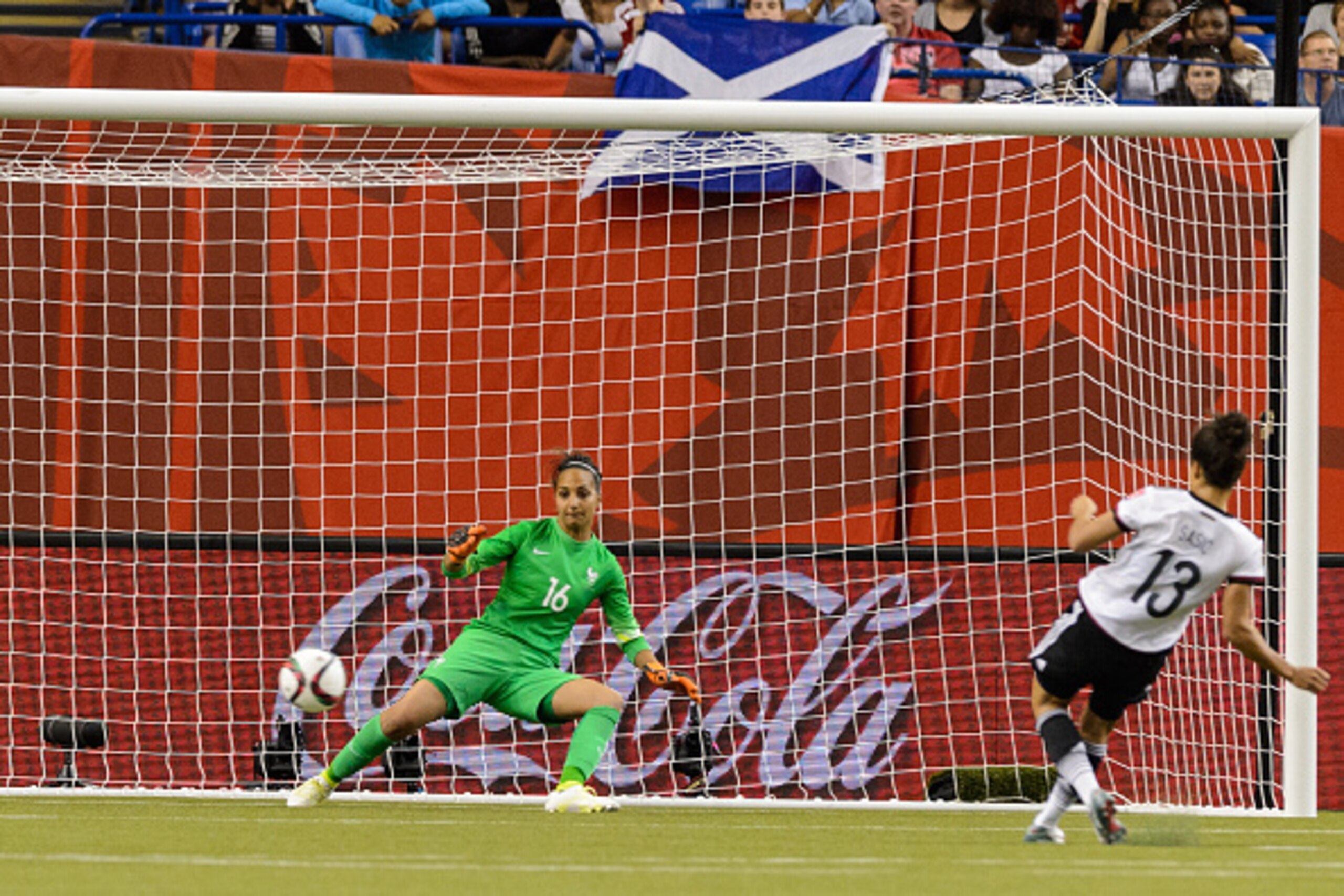 MONTREAL, QC - JUNE 26:  Goalkeeper Sarah Bouhaddi #16 of France tries to follow the ball on a penalty kick by Celia Sasic #13 of Germany during the 2015 FIFA Women's World Cup quarter final match at Olympic Stadium on June 26, 2015 in Montreal, Quebec, C
