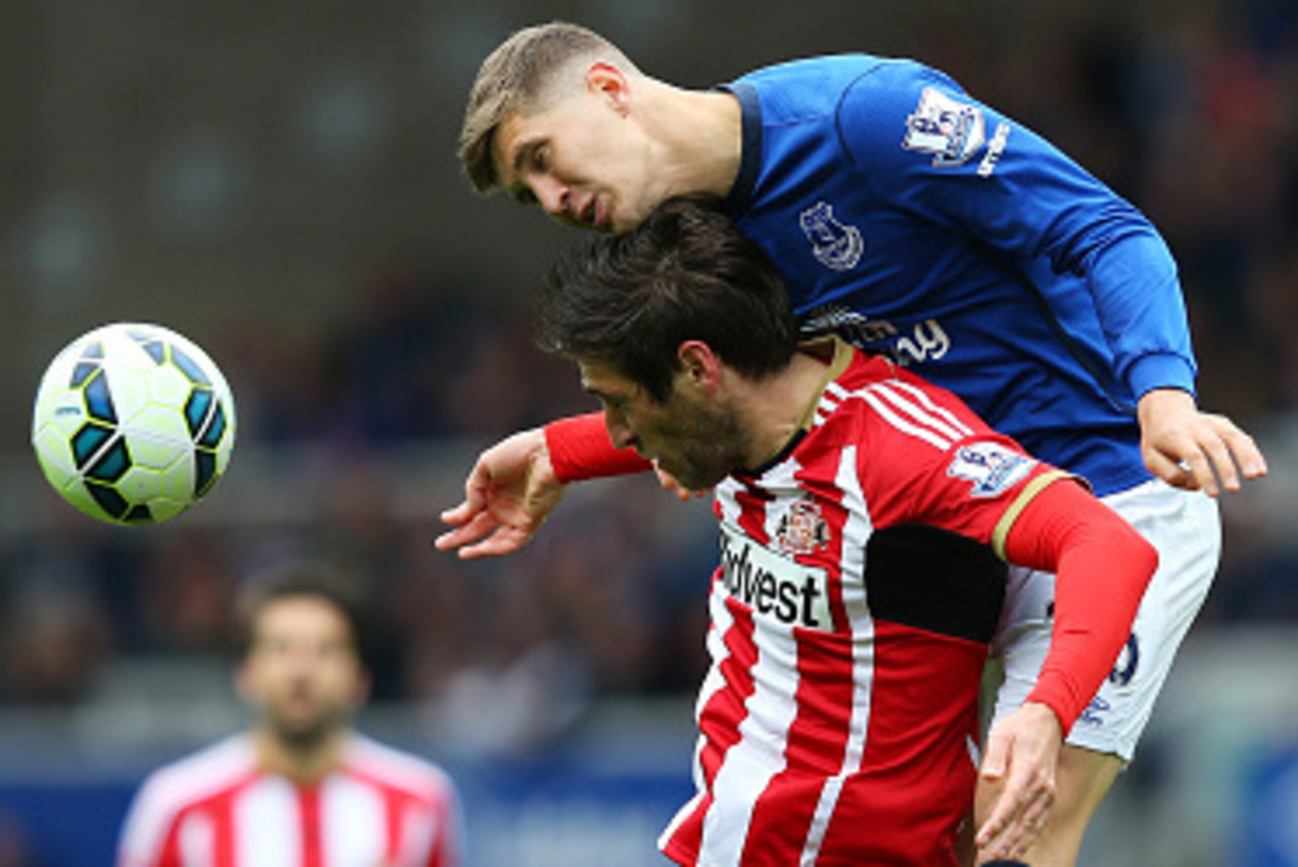 LIVERPOOL, ENGLAND - MAY 09: John Stones of Everton wins a header with Danny Graham of Sunderland during the Barclays Premier League match between Everton and Sunderland at Goodison Park on May 9, 2015 in Liverpool, England.  (Photo by Alex Livesey/Getty 