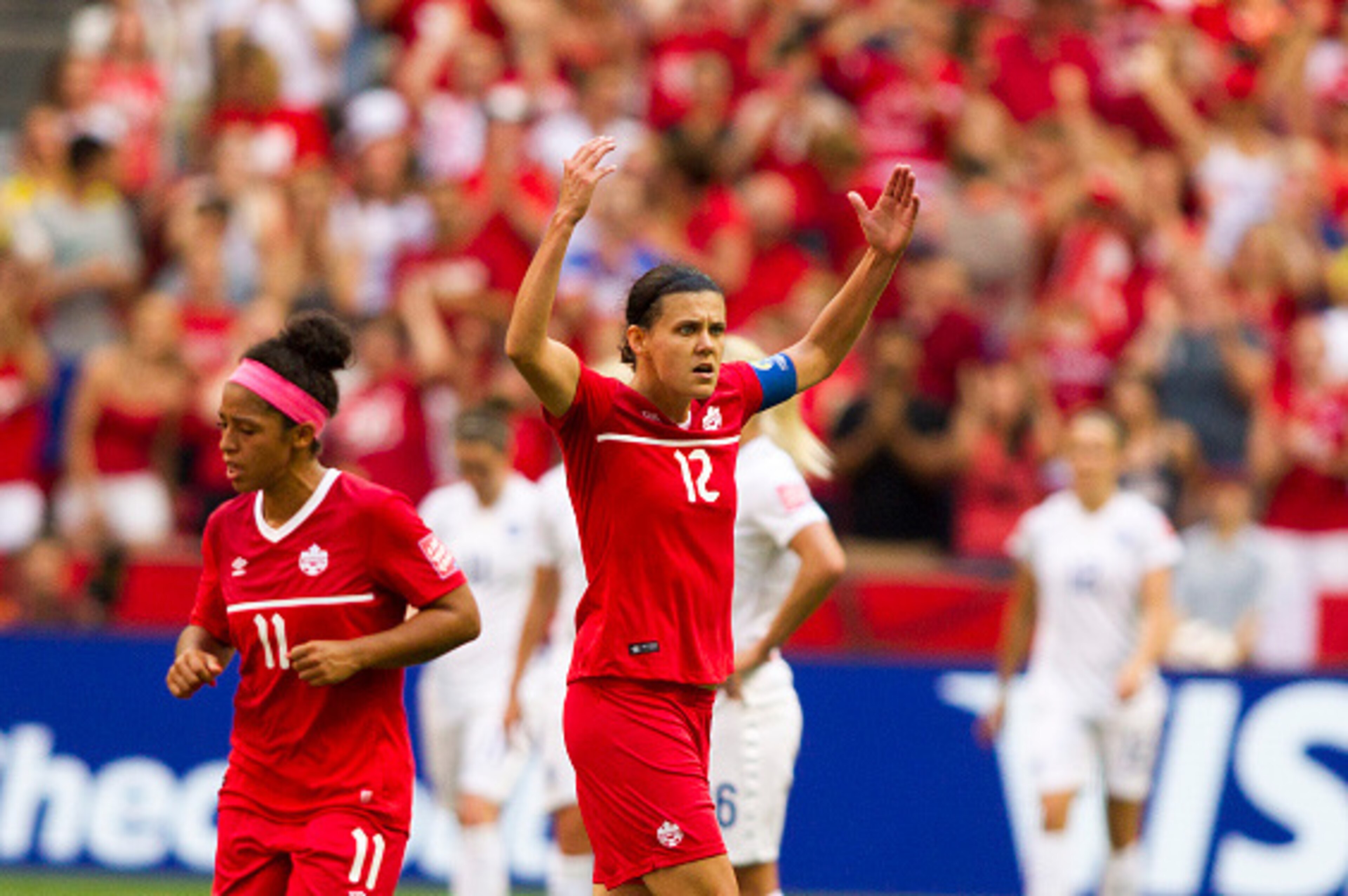 VANCOUVER, BC - JUNE 27: Christine Sinclair #12 of Canada gestures to the crowd after scoring against England during the FIFA Women's World Cup Canada 2015 Quarter Final match between England and Canada June 27, 2015 at BC Place Stadium in Vancouver, Brit