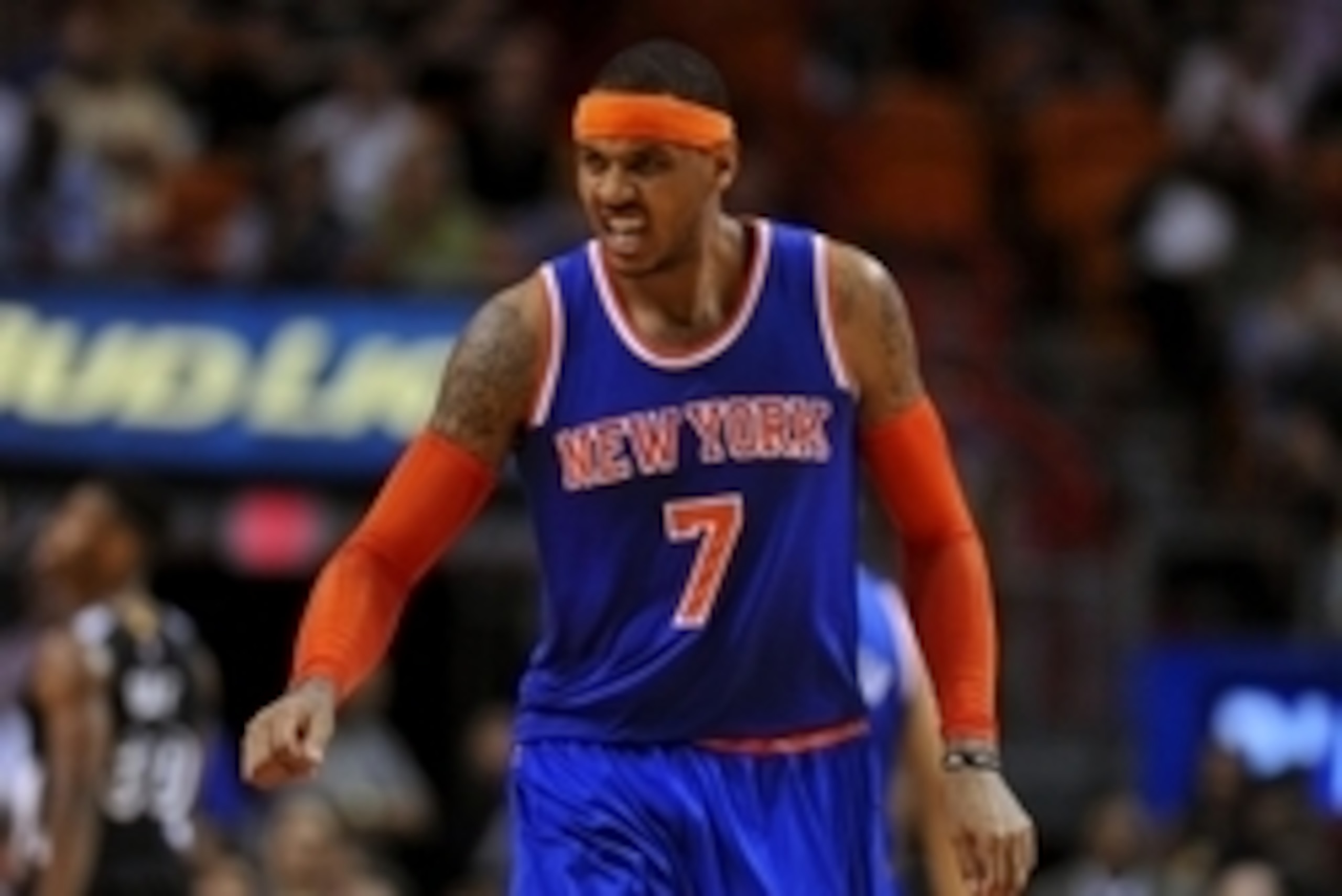 Feb 9, 2015; Miami, FL, USA; New York Knicks forward Carmelo Anthony (7) reacts after injuring himself during the second half  against the Miami Heat at American Airlines Arena. Miami won 109-95. Mandatory Credit: Steve Mitchell-USA TODAY Sports
