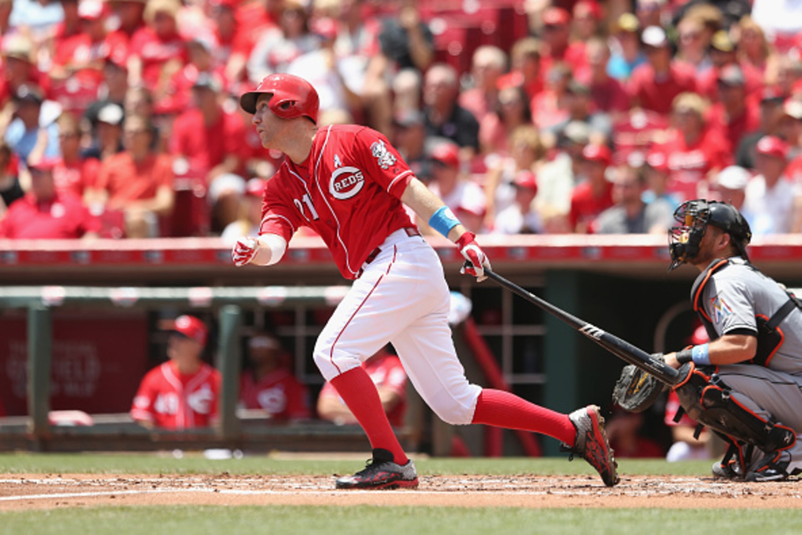 CINCINNATI, OH - JUNE 21:  Todd Frazier #21 of the Cincinnati Reds hits a homerun in the first inning during the game against the Miami Marlins at Great American Ball Park on June 21, 2015 in Cincinnati, Ohio.  (Photo by Andy Lyons/Getty Images)