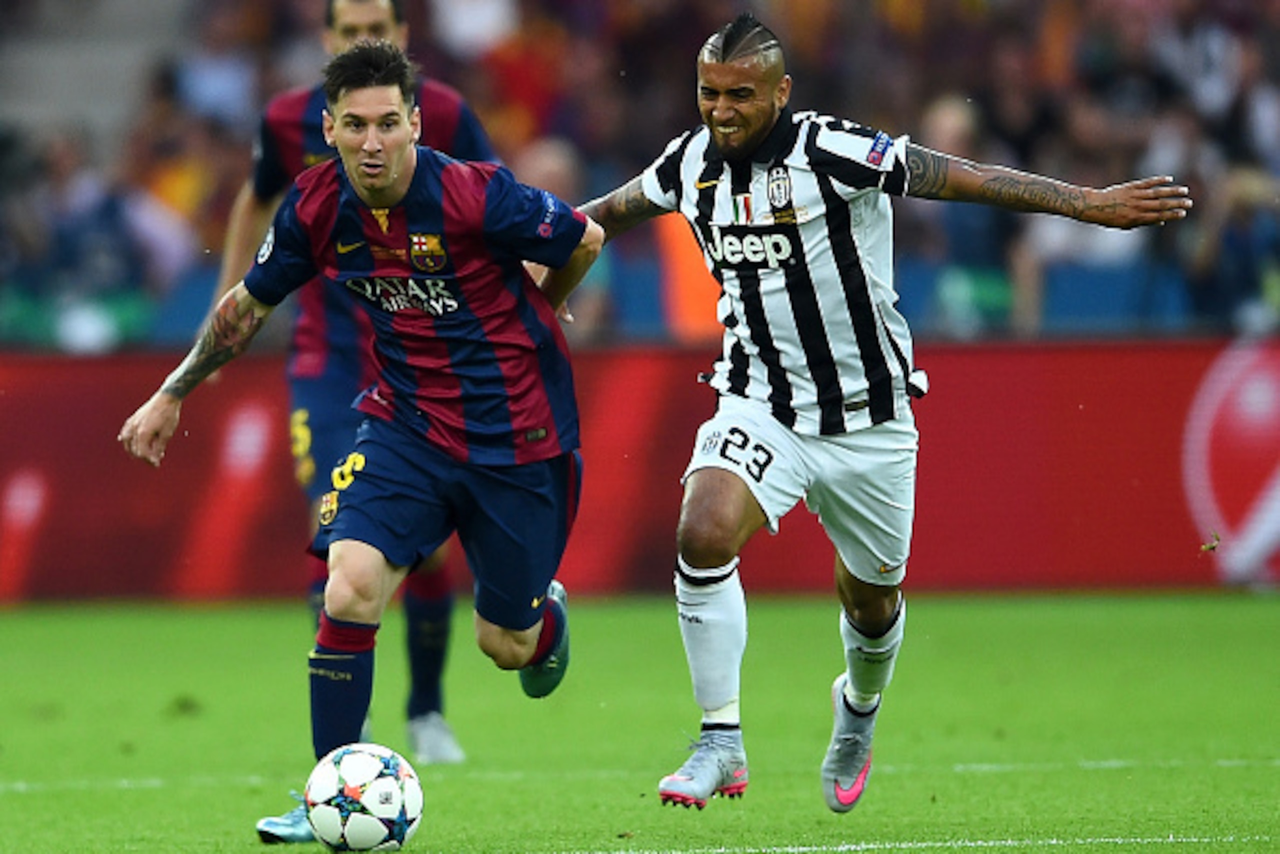 BERLIN, GERMANY - JUNE 06: Lionel Messi of Barcelona takes on Arturo Vidal of Juventus during the UEFA Champions League Final between Juventus and FC Barcelona at Olympiastadion on June 6, 2015 in Berlin, Germany. (Photo by Laurence Griffiths/Getty Image BERLIN, GERMANY - JUNE 06: Lionel Messi of Barcelona takes on Arturo Vidal of Juventus during the UEFA Champions League Final between Juventus and FC Barcelona at Olympiastadion on June 6, 2015 in Berlin, Germany. (Photo by Laurence Griffiths/Getty Image