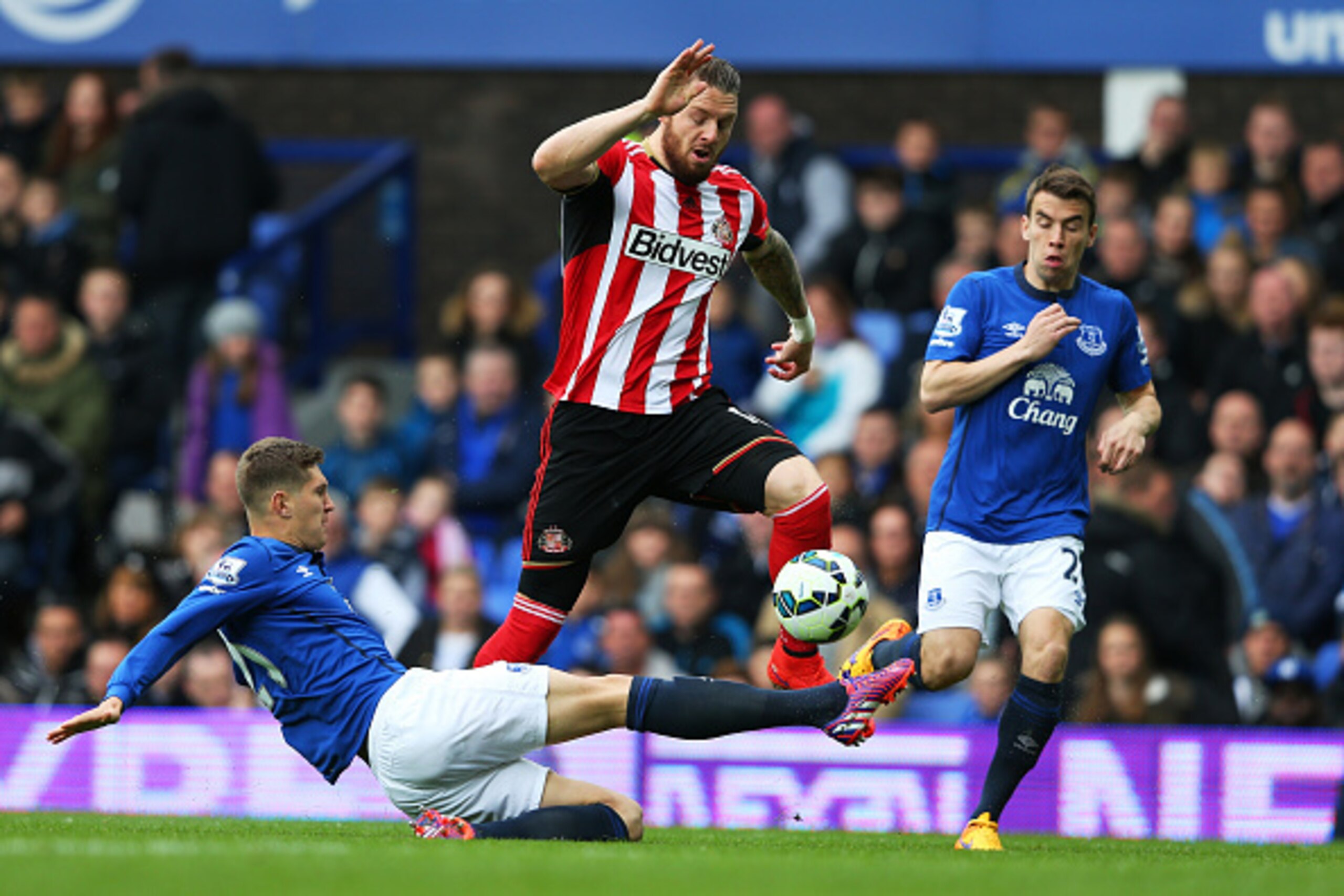 LIVERPOOL, ENGLAND - MAY 09:  Connor Wickham of Sunderland skips a challenge from John Stones (L) and Seamus Coleman of Everton during the Barclays Premier League match between Everton and Sunderland at Goodison Park on May 9, 2015 in Liverpool, England. 