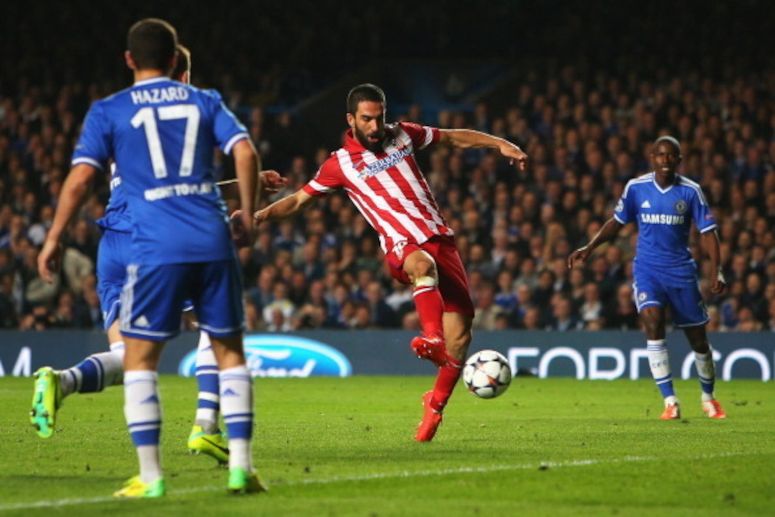 LONDON, ENGLAND - APRIL 30:  Arda Turan of Club Atletico de Madrid scores his team's third goal during the UEFA Champions League semi-final second leg match between Chelsea and Club Atletico de Madrid at Stamford Bridge on April 30, 2014 in London, Englan