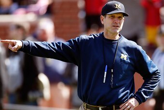 ANN ARBOR, MI - APRIL 04: Head coach Jim Harbaugh of the Michigan Wolverines looks on during the Michigan Football Spring Game on April 4, 2015 at Michigan Stadium in Ann Arbor, Michigan.  (Photo by Gregory Shamus/Getty Images)