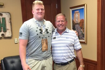 Parker Boudreaux with Brian Kelly