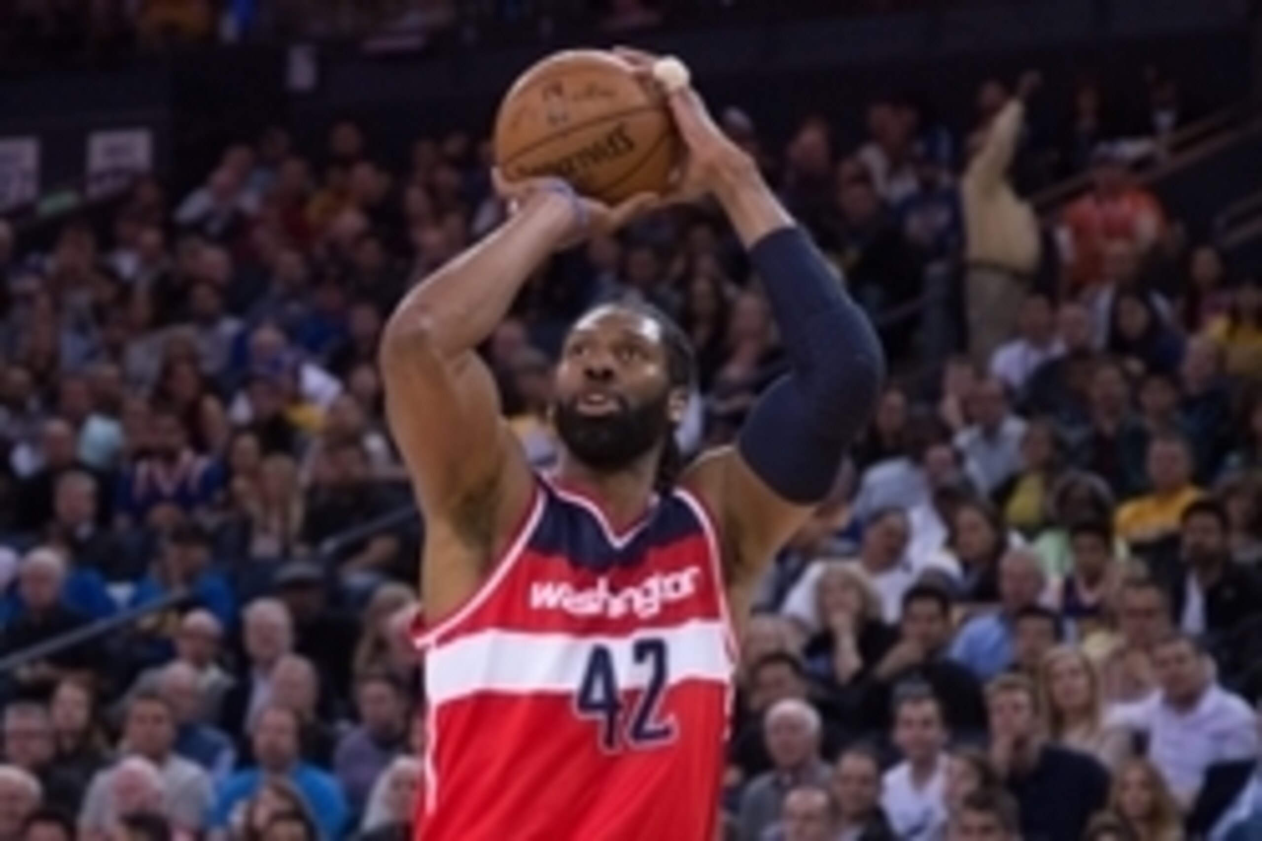 March 23, 2015; Oakland, CA, USA; Washington Wizards forward Nene Hilario (42) shoots the basketball during the first quarter against the Golden State Warriors at Oracle Arena. Mandatory Credit: Kyle Terada-USA TODAY Sports