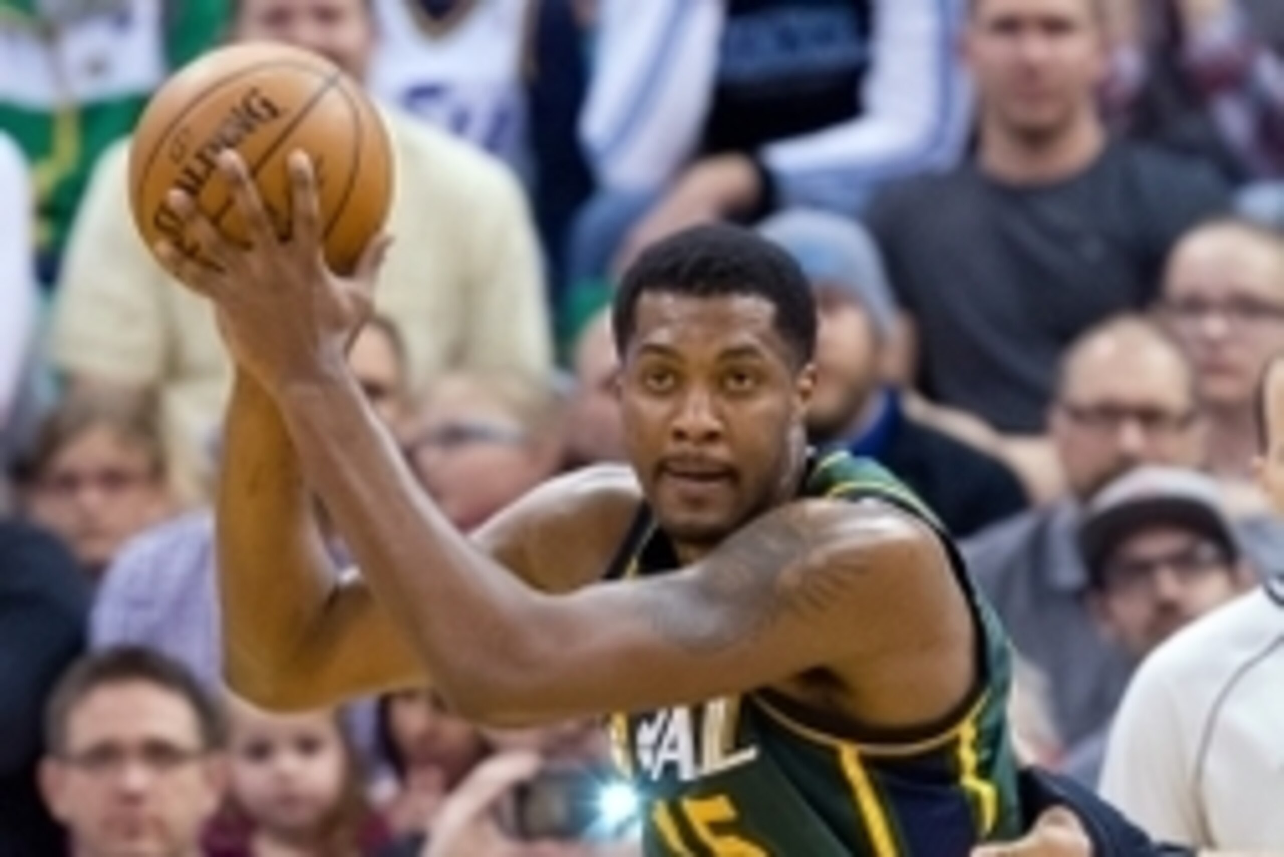 Mar 25, 2015; Salt Lake City, UT, USA; Utah Jazz forward Derrick Favors (15) controls the ball during the first half against the Portland Trail Blazers at EnergySolutions Arena. Mandatory Credit: Russ Isabella-USA TODAY Sports